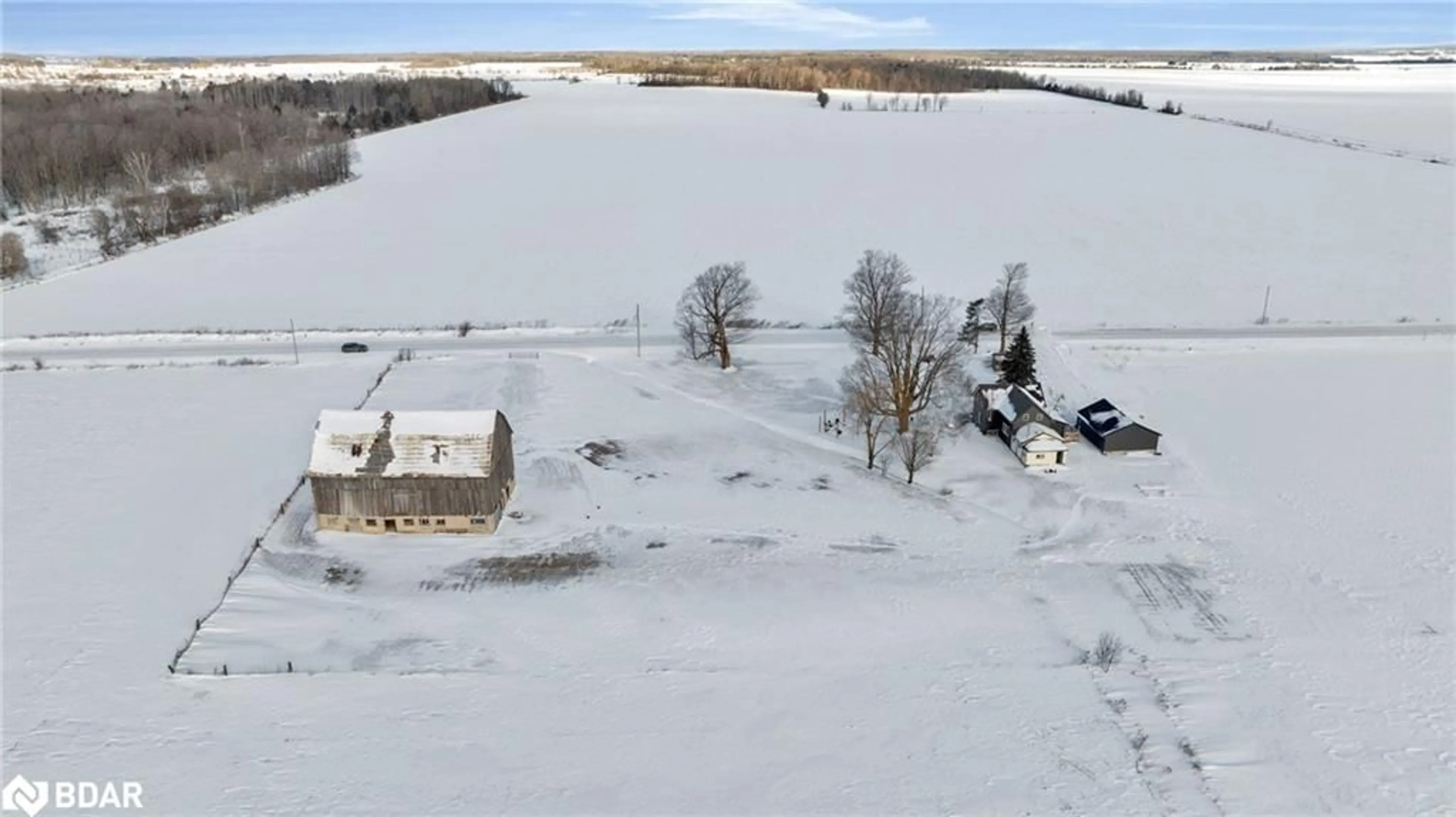 A pic from outside/outdoor area/front of a property/back of a property/a pic from drone, street for 4355 7 Sunnidale Concession, New Lowell Ontario L0M 1N0