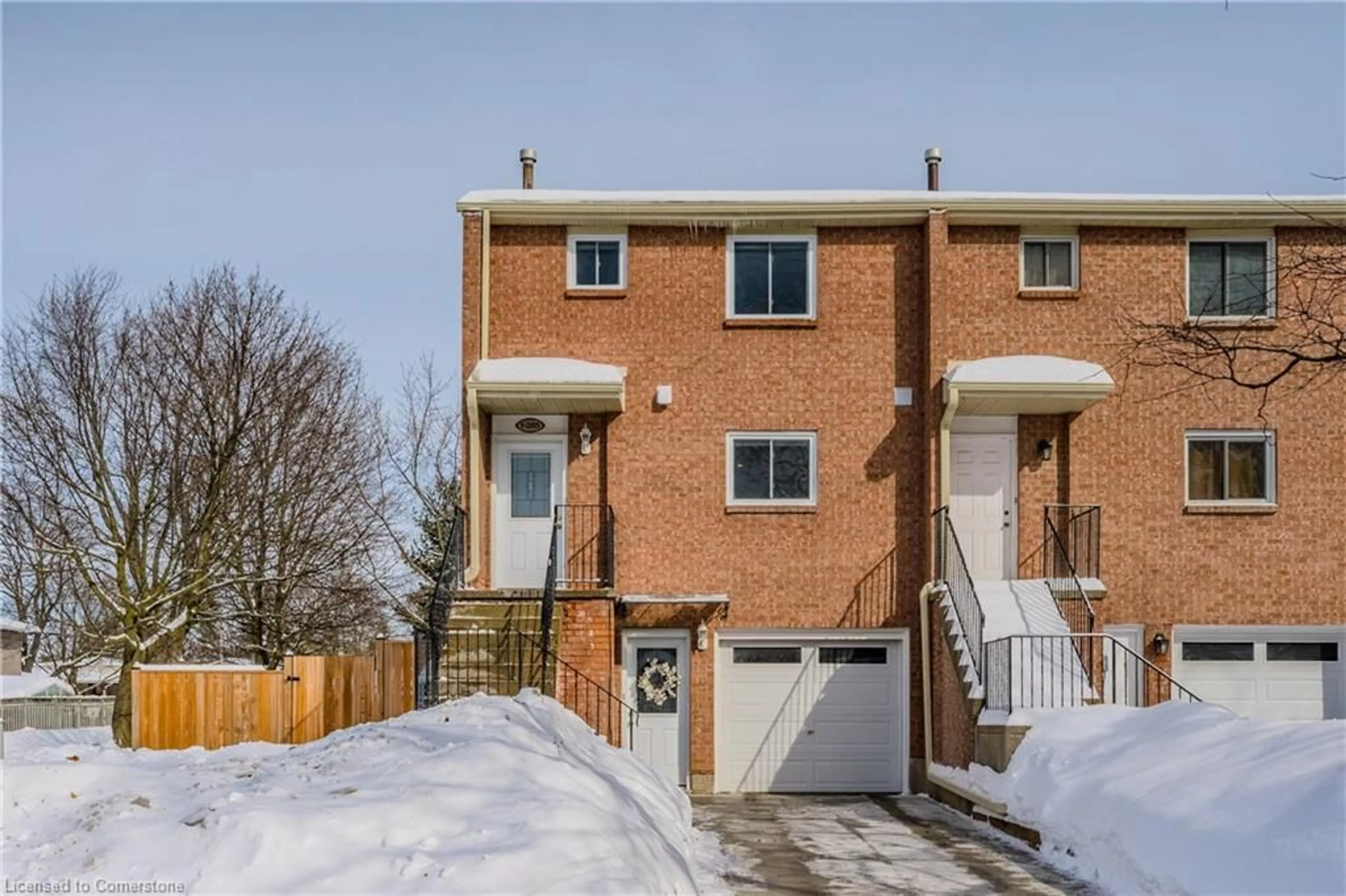 Home with brick exterior material, street for 265 Camelot Crt #1, Waterloo Ontario N2K 3G2