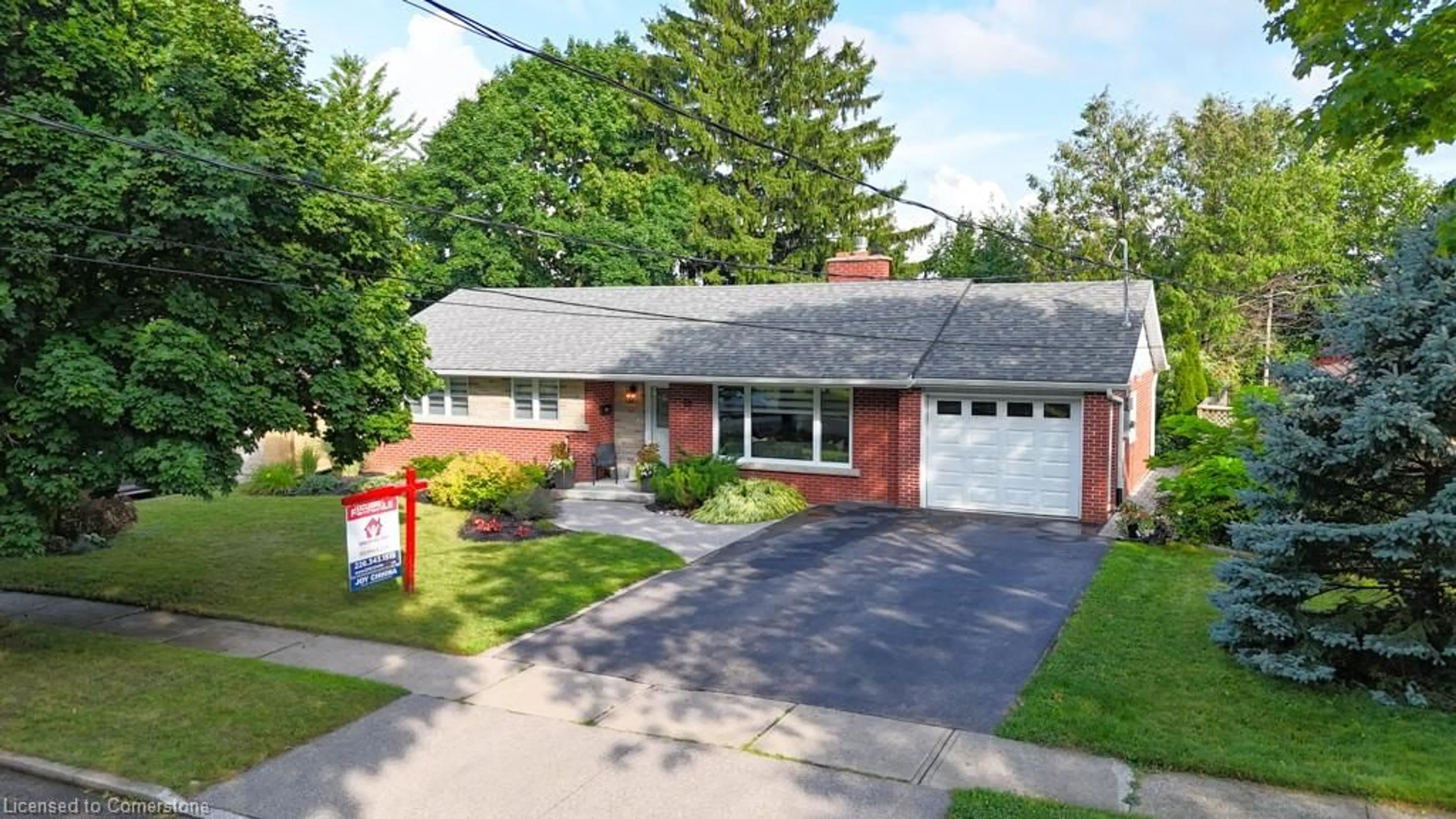 Home with brick exterior material, street for 65 Kensington St, Guelph Ontario N1E 3P6