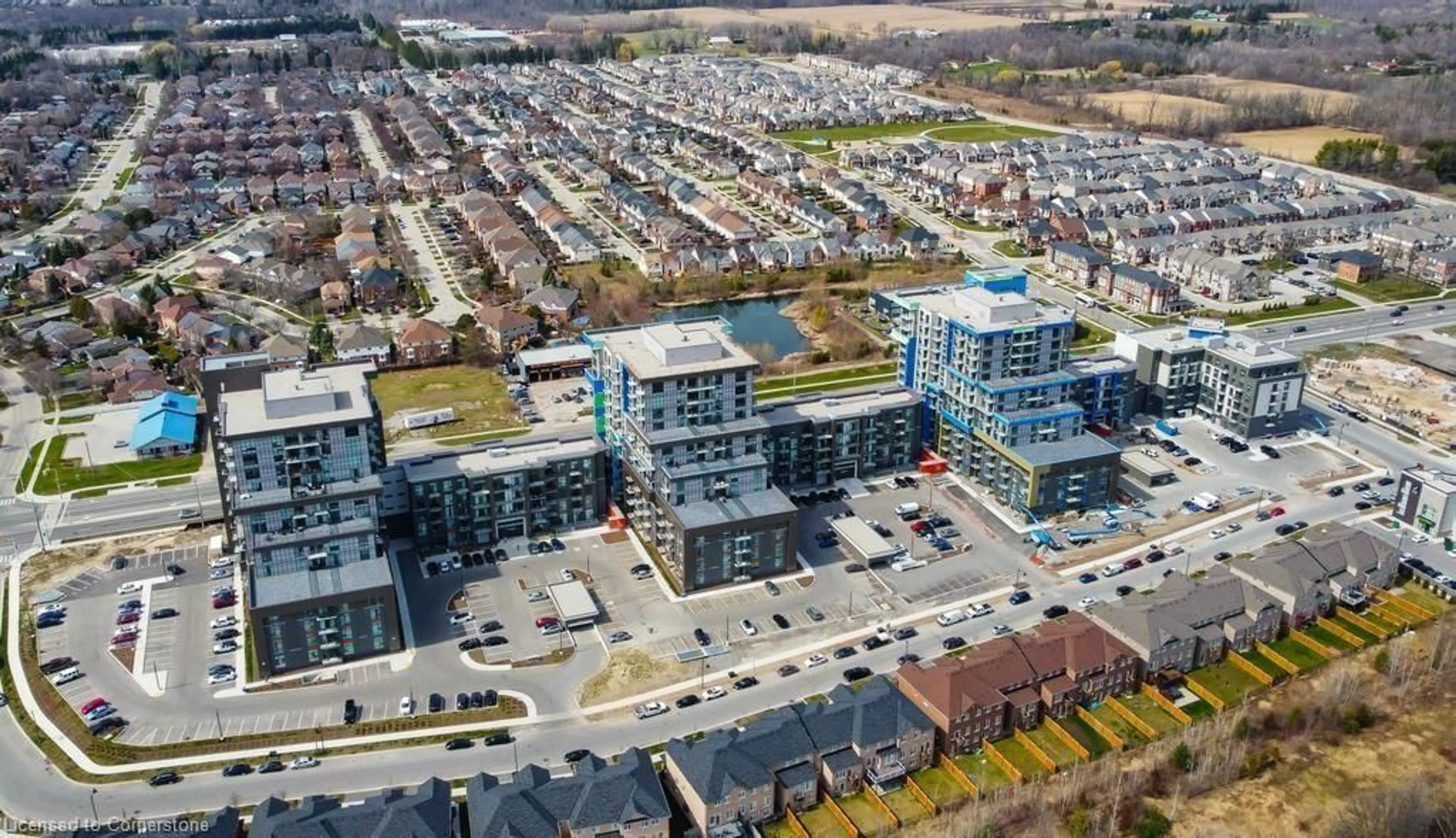 A pic from outside/outdoor area/front of a property/back of a property/a pic from drone, city buildings view from balcony for 450 Dundas St #327, Waterdown Ontario L0R 2H4