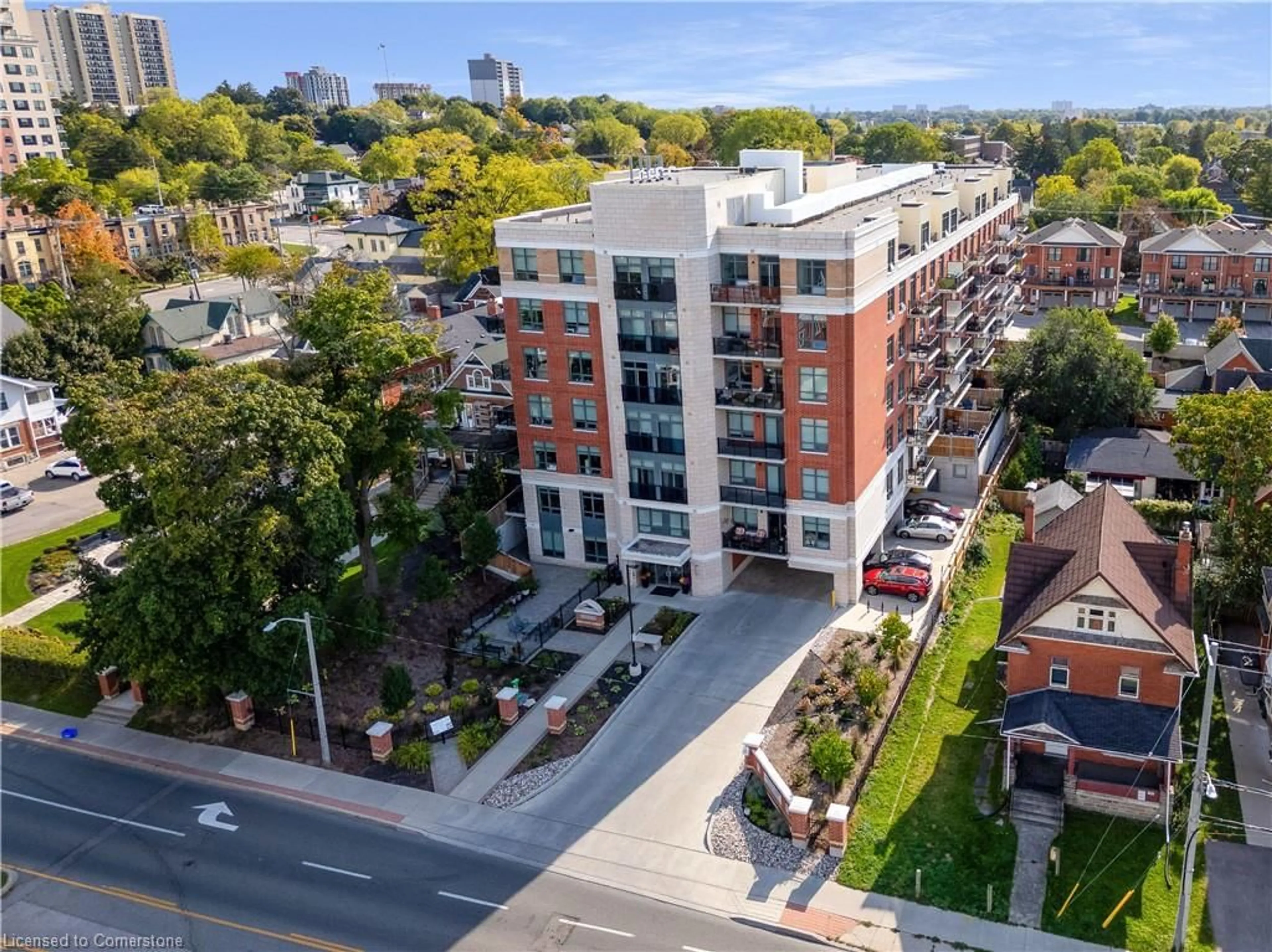 A pic from outside/outdoor area/front of a property/back of a property/a pic from drone, city buildings view from balcony for 399 Queen St S #211, Kitchener Ontario N2G 0C4