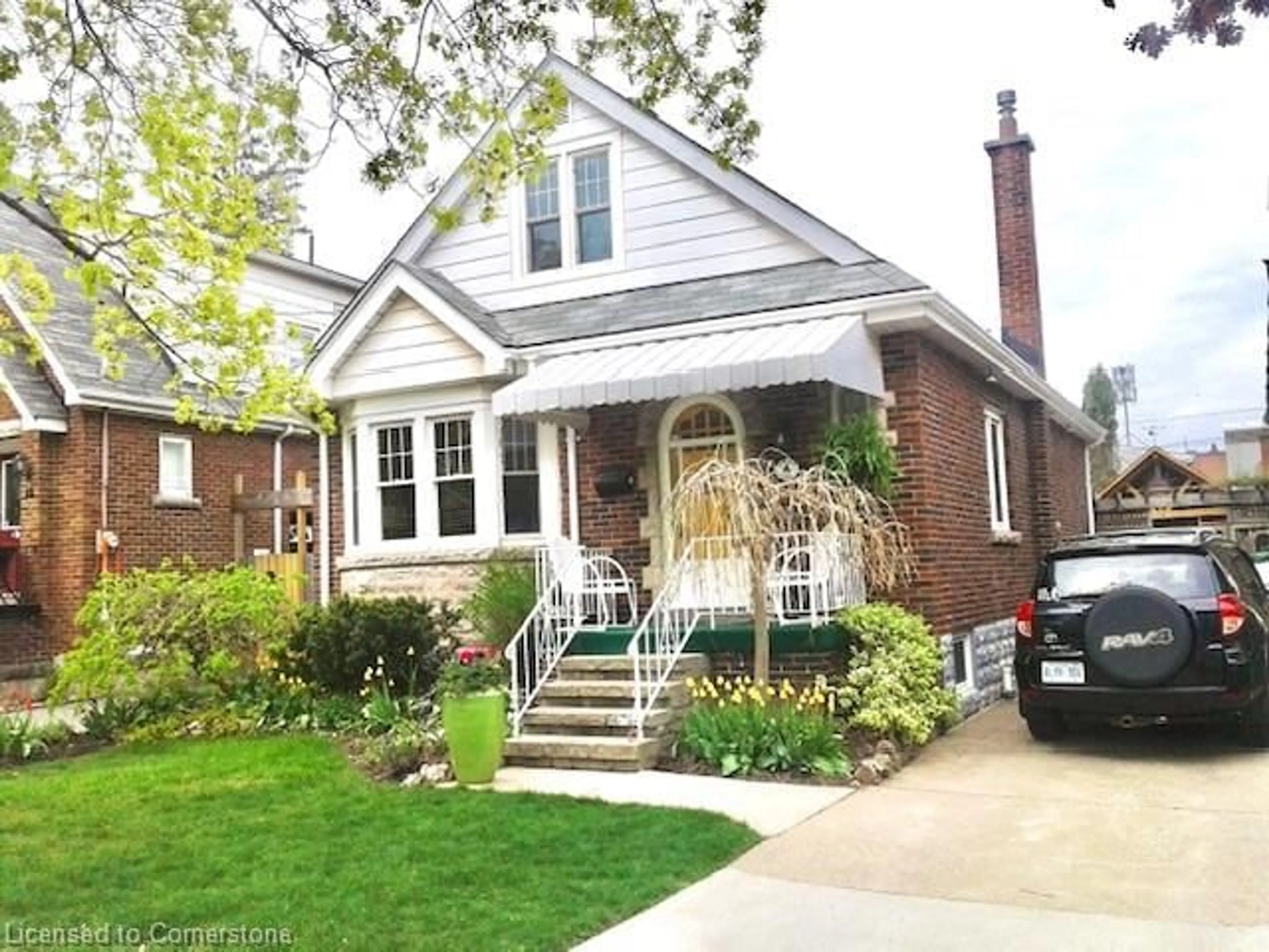 Home with brick exterior material, street for 6 Park Row, Hamilton Ontario L8K 2J4