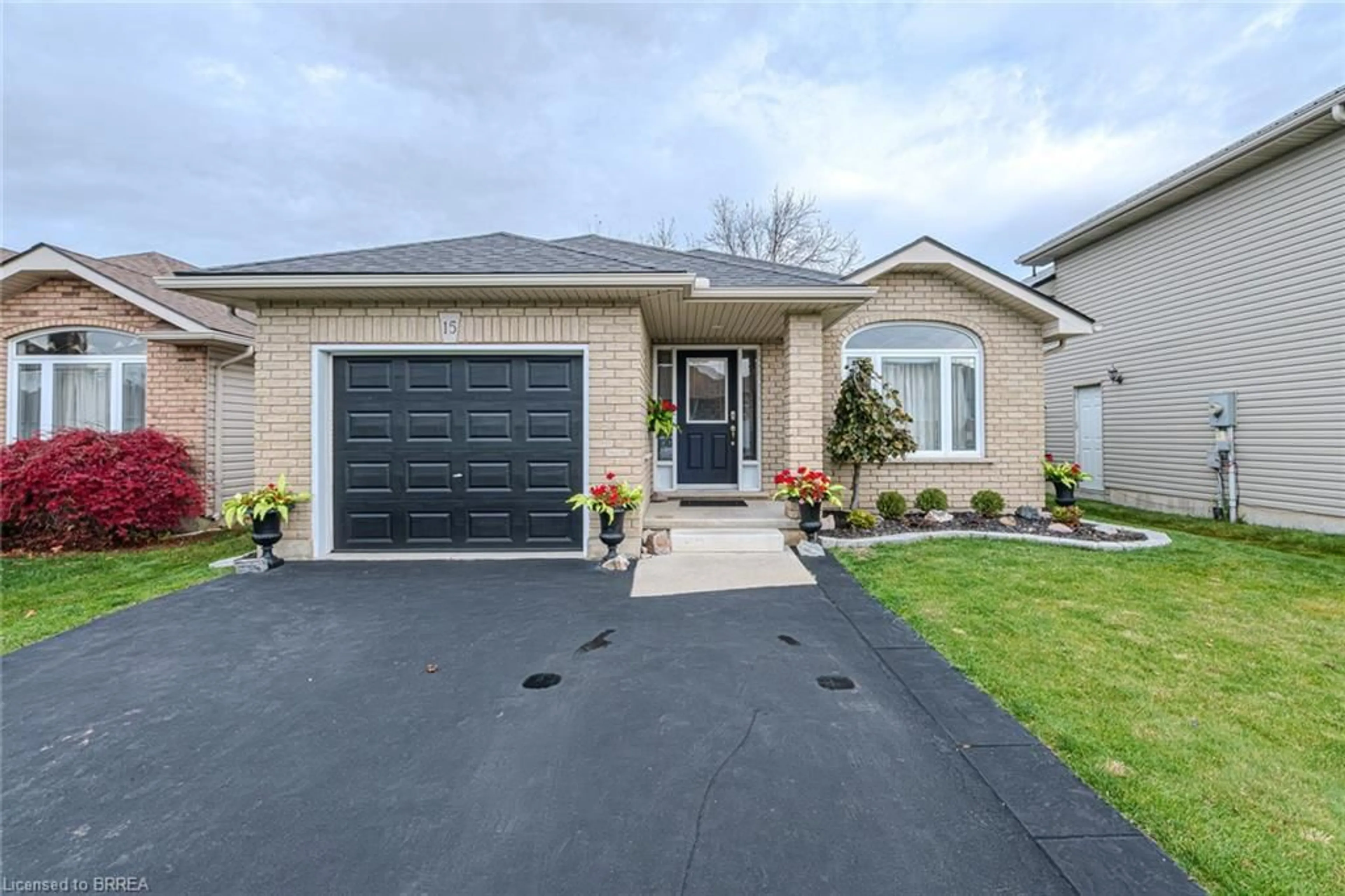 Home with brick exterior material, street for 15 Landon Ave, Simcoe Ontario N3Y 5J8