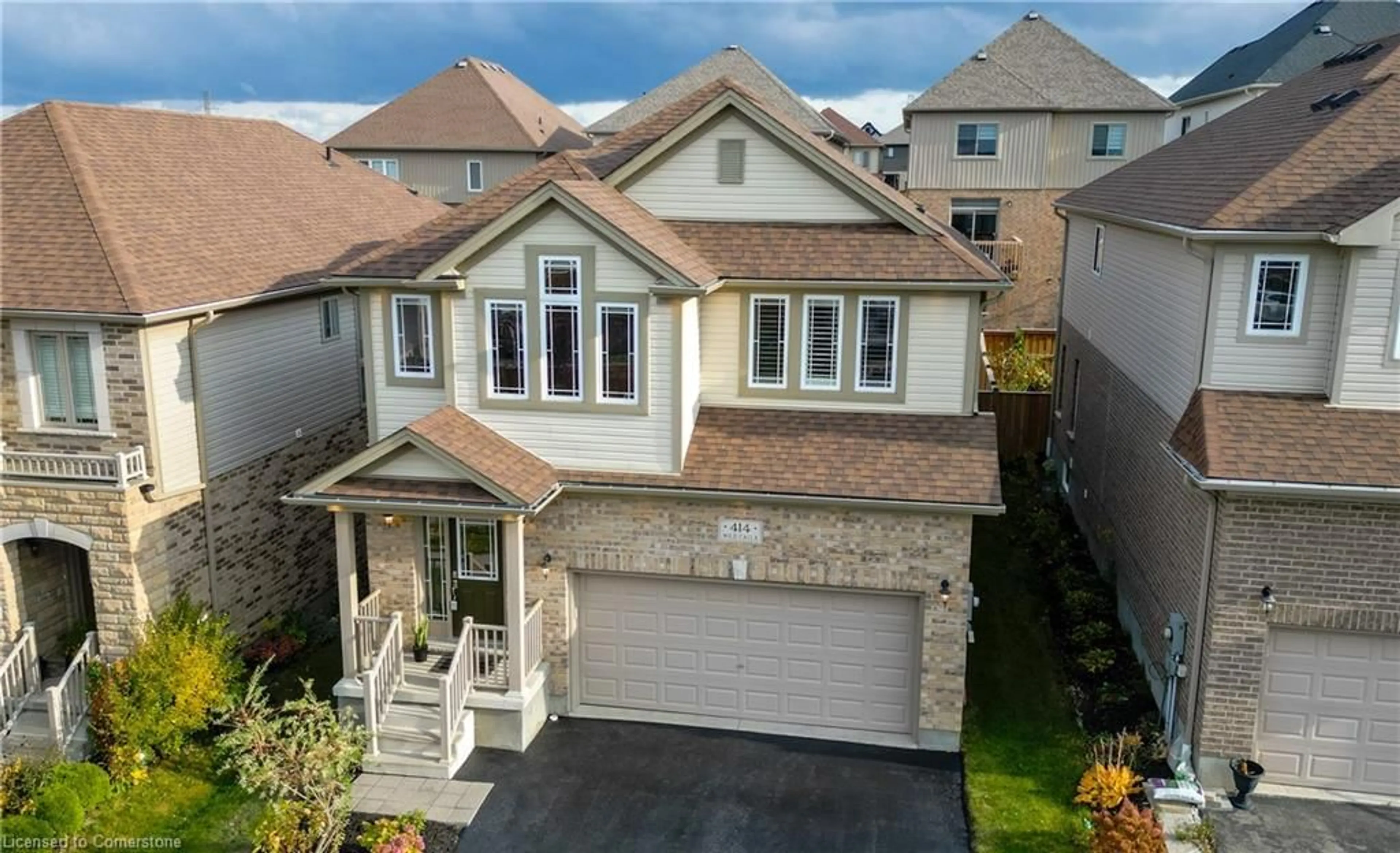 A pic from outside/outdoor area/front of a property/back of a property/a pic from drone, street for 414 Wild Calla St, Waterloo Ontario N2V 0B5