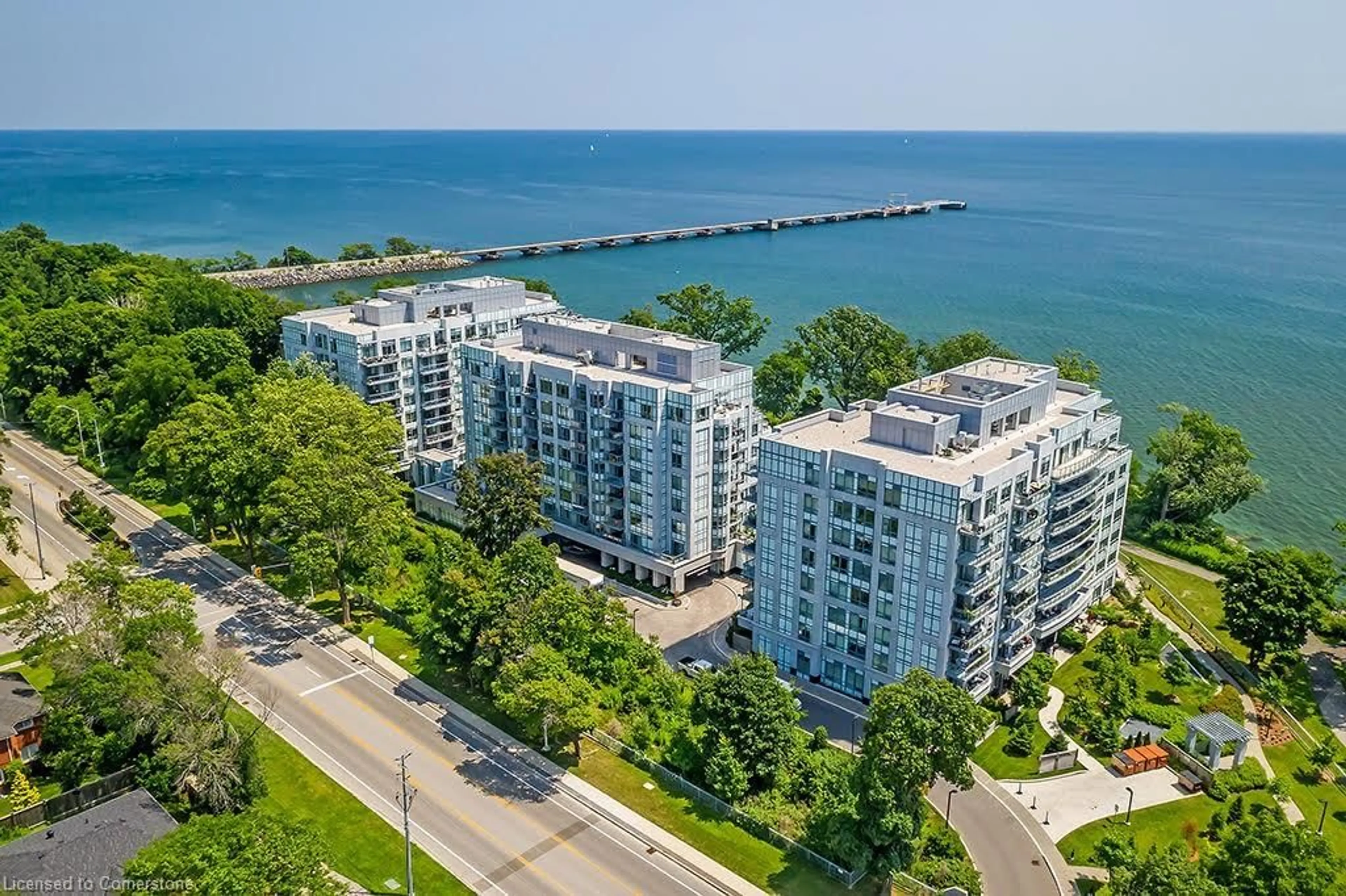 A pic from outside/outdoor area/front of a property/back of a property/a pic from drone, water/lake/river/ocean view for 3500 Lakeshore Rd #815, Oakville Ontario L6L 0B4