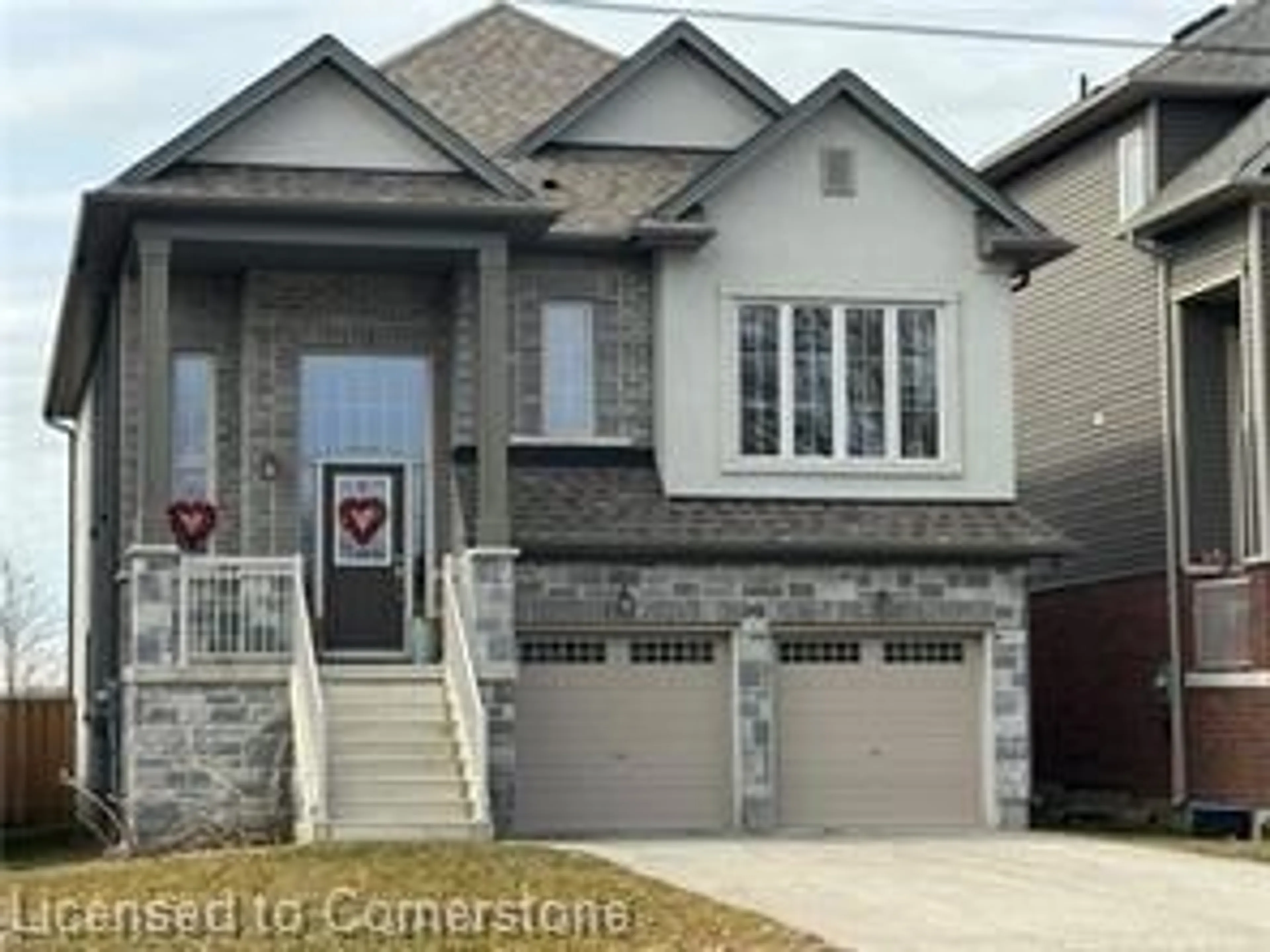 Home with brick exterior material, street for 389 Erie Ave, Brantford Ontario N3S 2H7