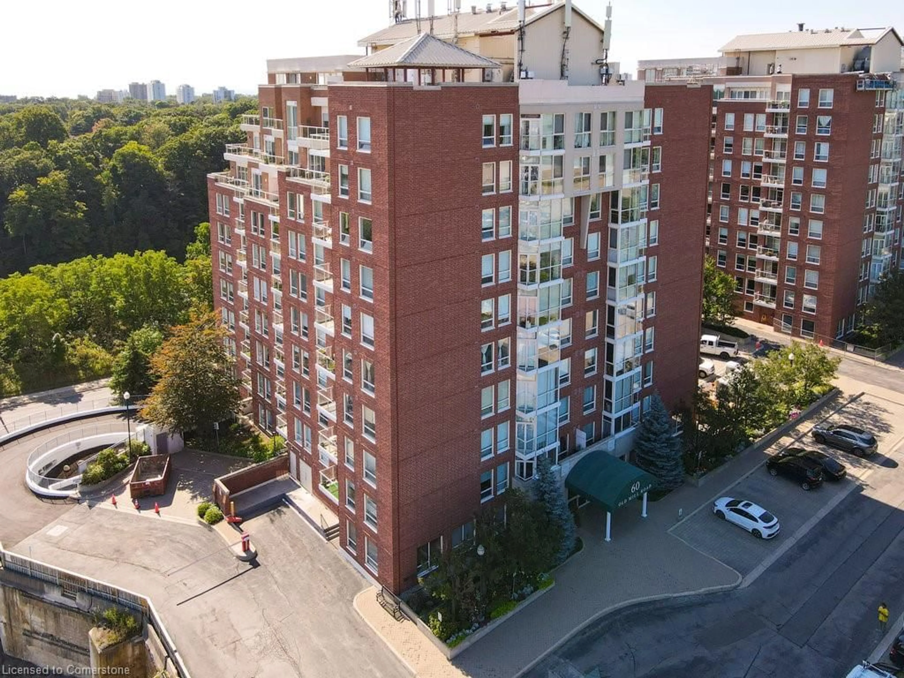 A pic from outside/outdoor area/front of a property/back of a property/a pic from drone, city buildings view from balcony for 60 Old Mill Rd #505, Oakville Ontario L6J 7V9