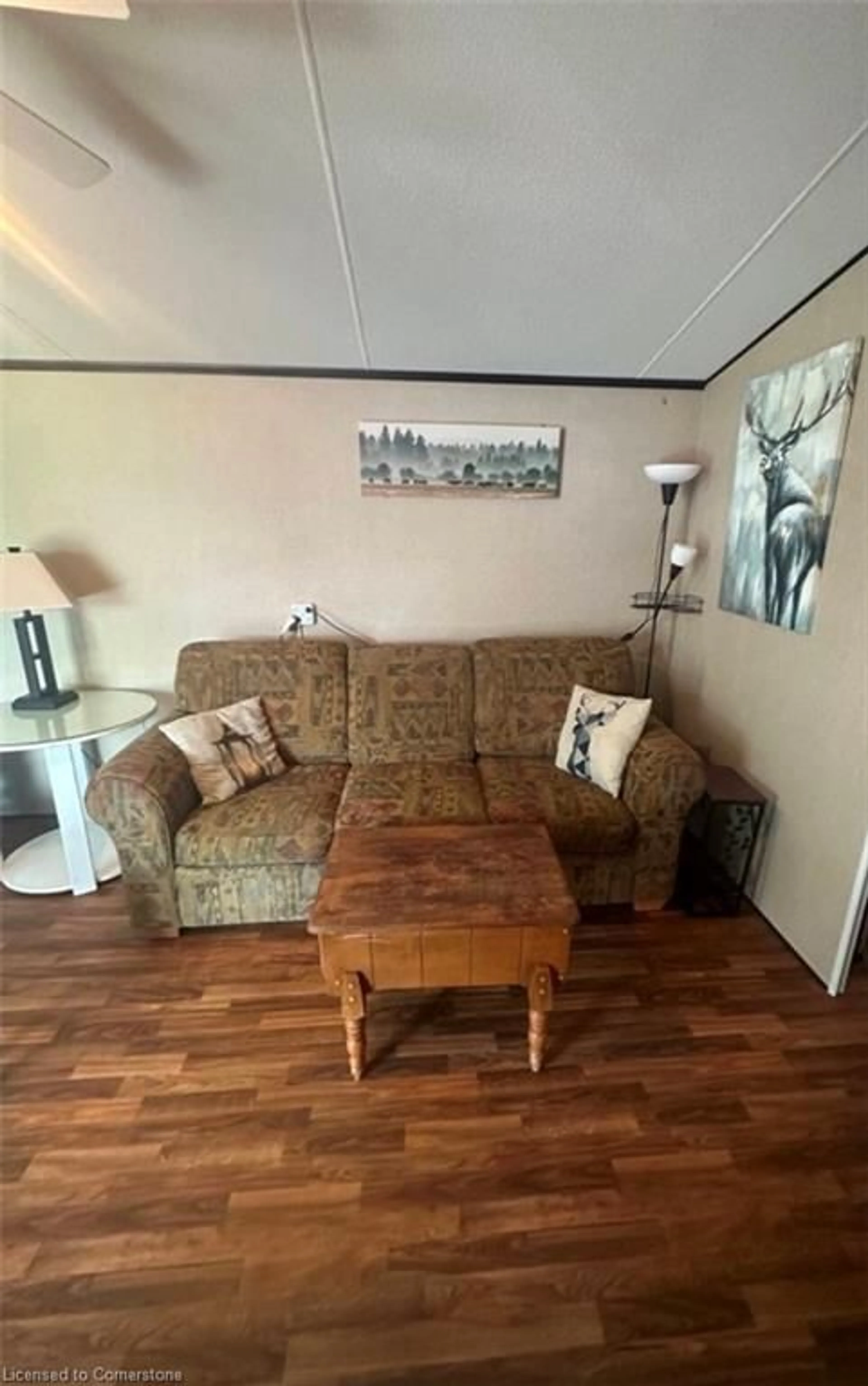 Living room with furniture, wood/laminate floor for 2325 Victoria Ave #504, Vineland Ontario L0S 1C0