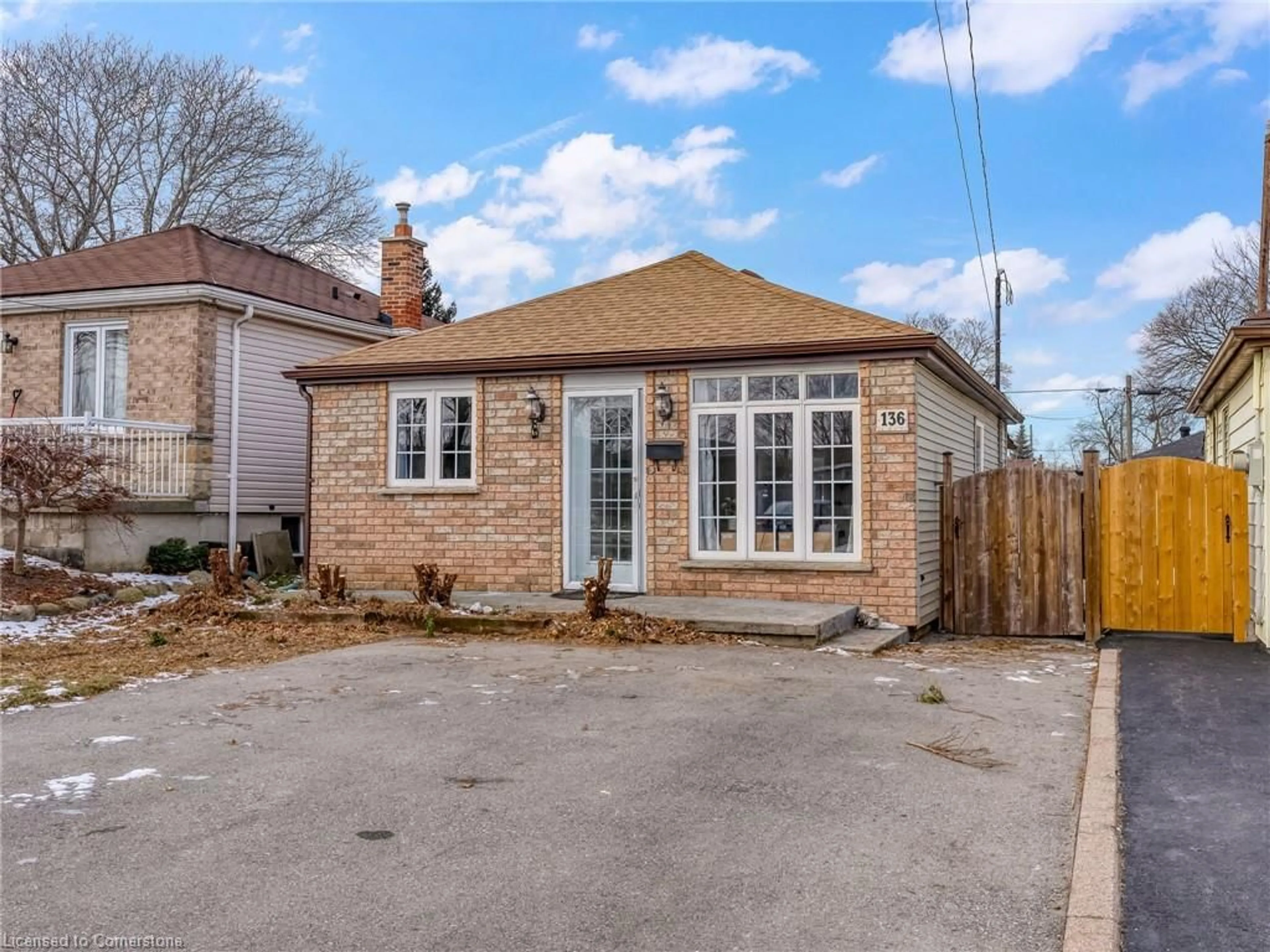 Home with brick exterior material, street for 136 East 45th St, Hamilton Ontario L8T 3K1