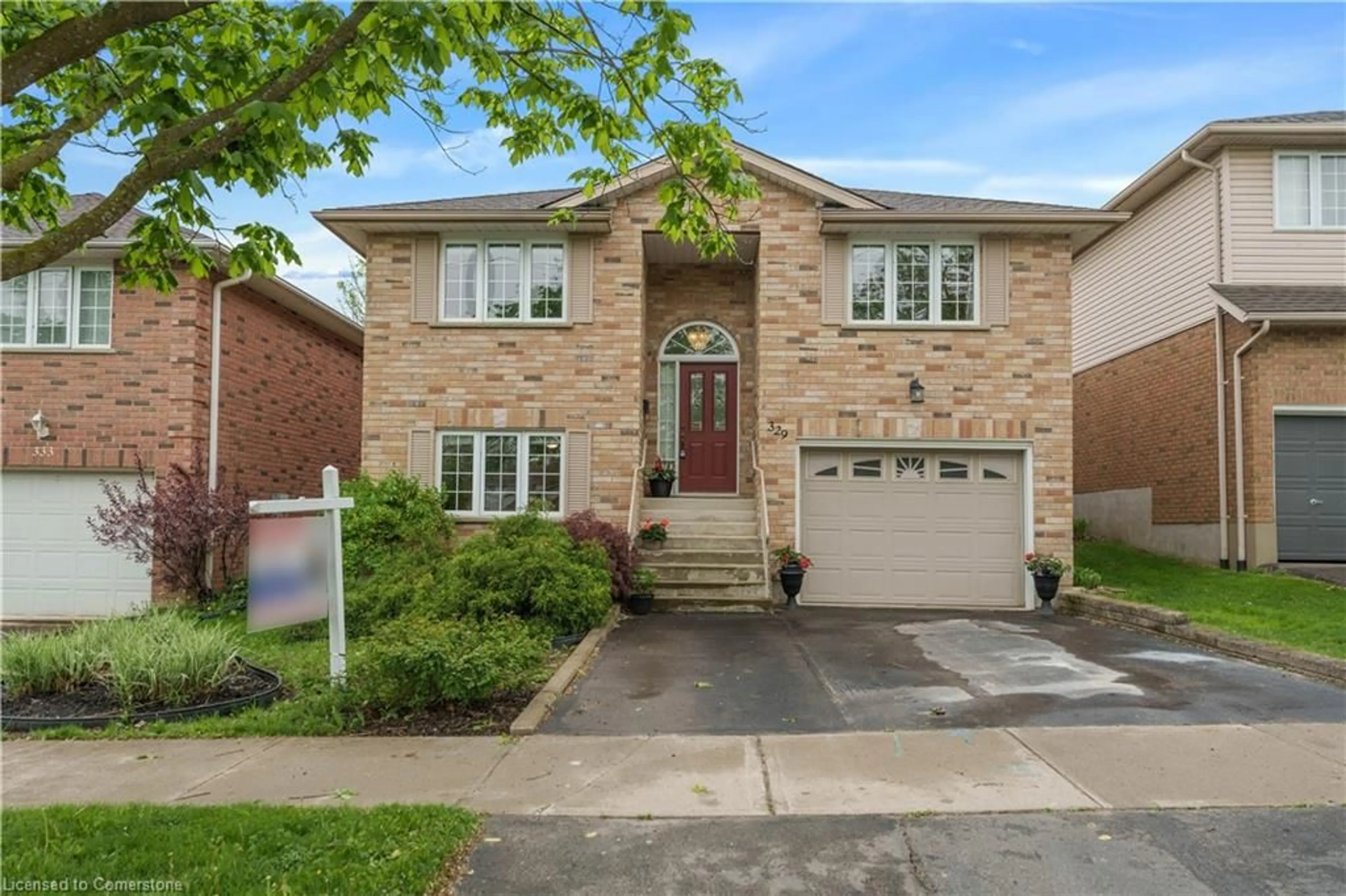 Home with brick exterior material, street for 329 Otterbein Rd, Kitchener Ontario N2B 3W1