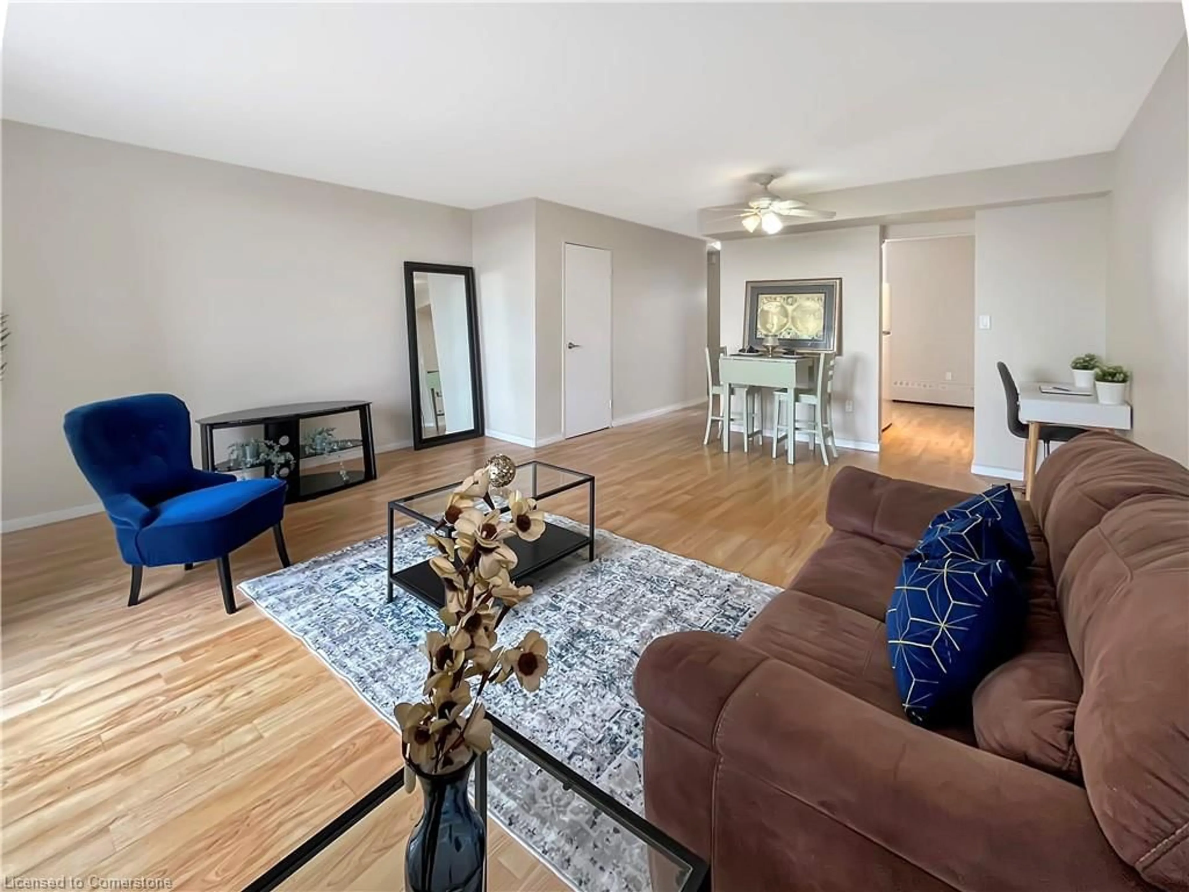 Living room with furniture, unknown for 350 Quigley Rd #712, Hamilton Ontario L8K 5N2