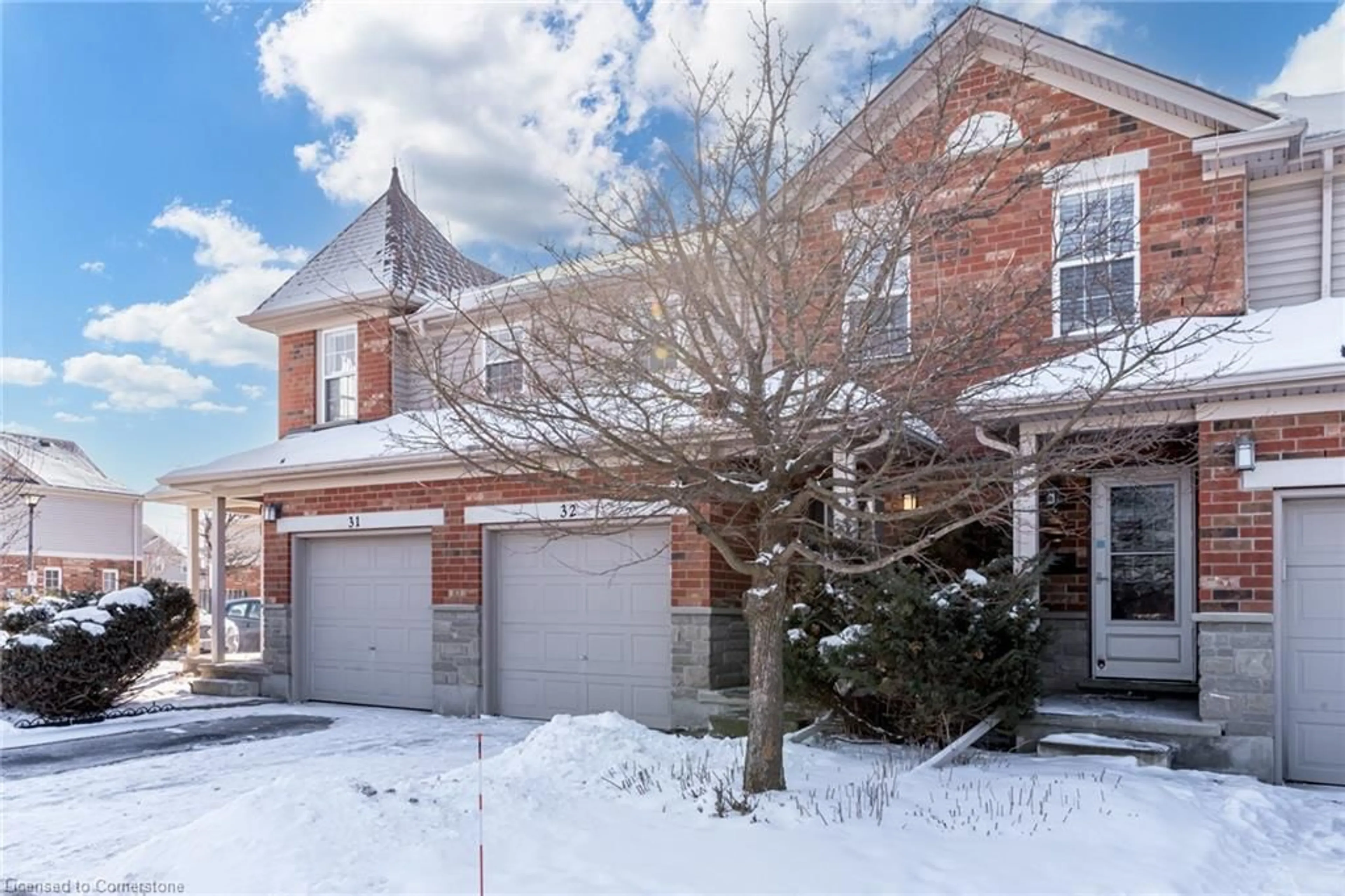 Home with brick exterior material, street for 124 Gosling Gardens #32, Guelph Ontario N1G 5K6