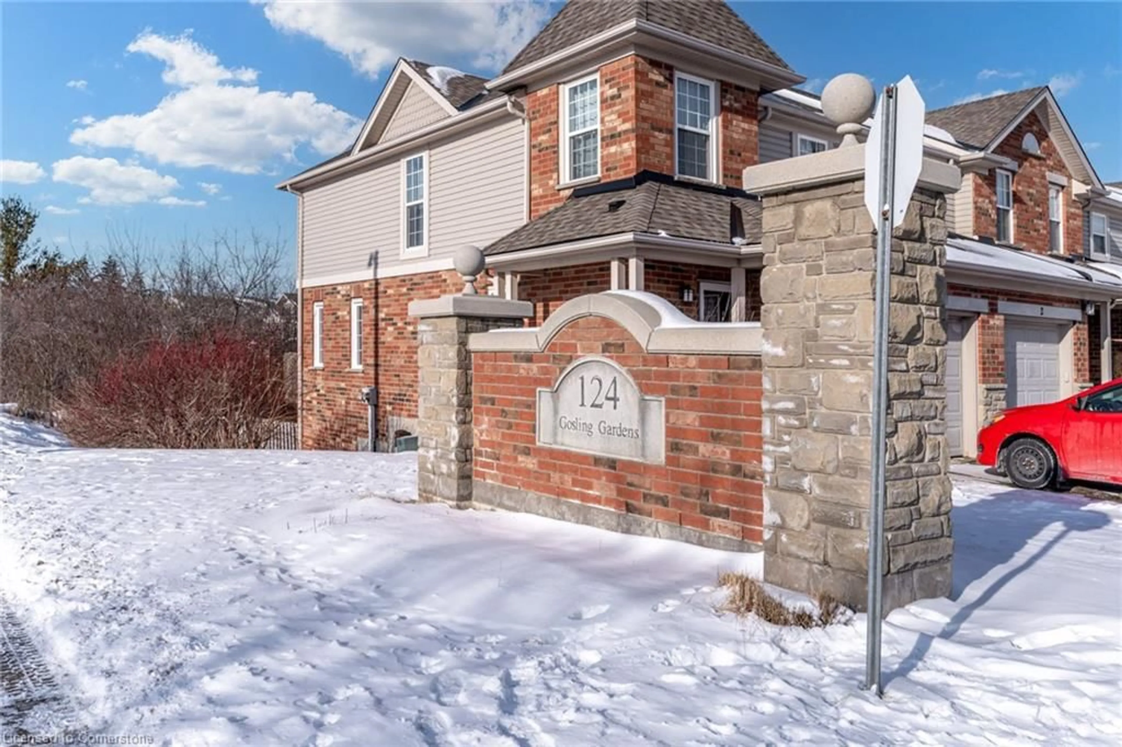 Home with brick exterior material, street for 124 Gosling Gardens #32, Guelph Ontario N1G 5K6