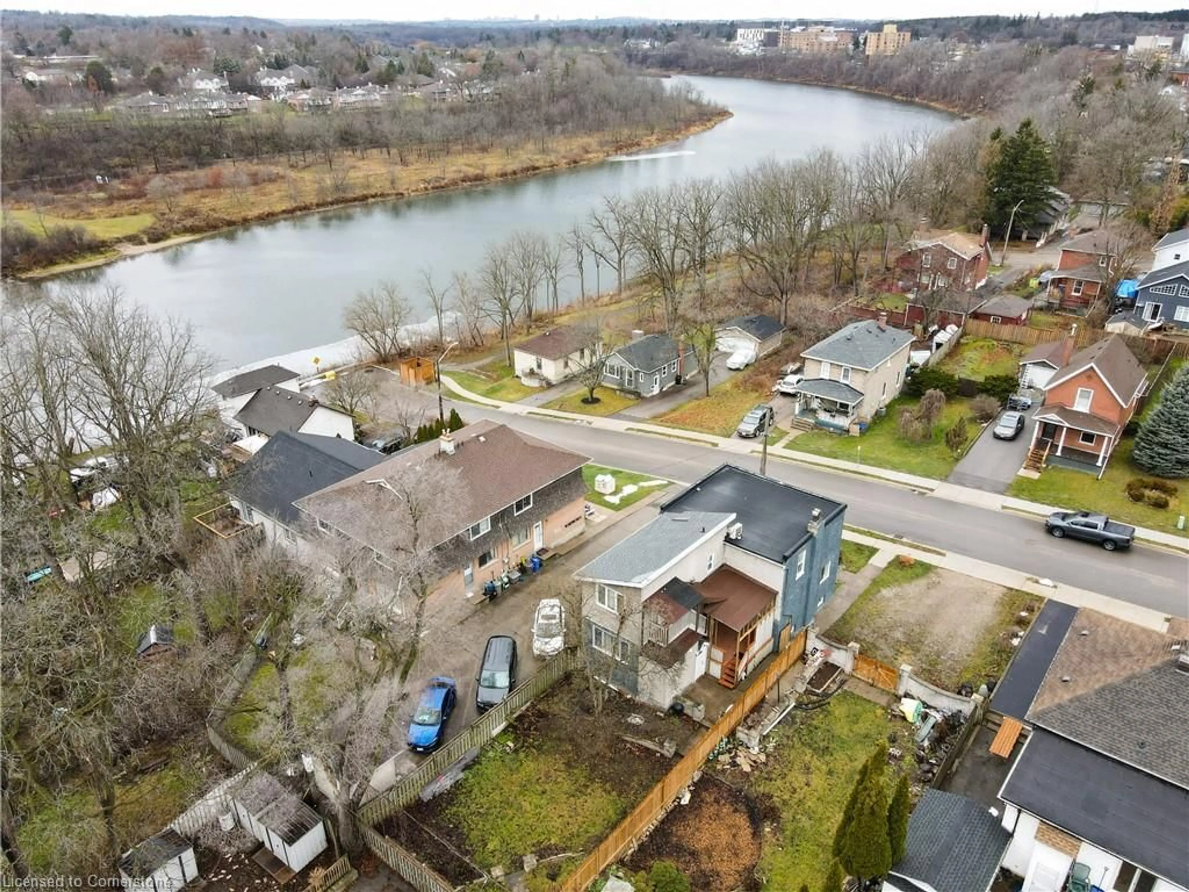 A pic from outside/outdoor area/front of a property/back of a property/a pic from drone, water/lake/river/ocean view for 15 Todd St, Cambridge Ontario N1R 1G6