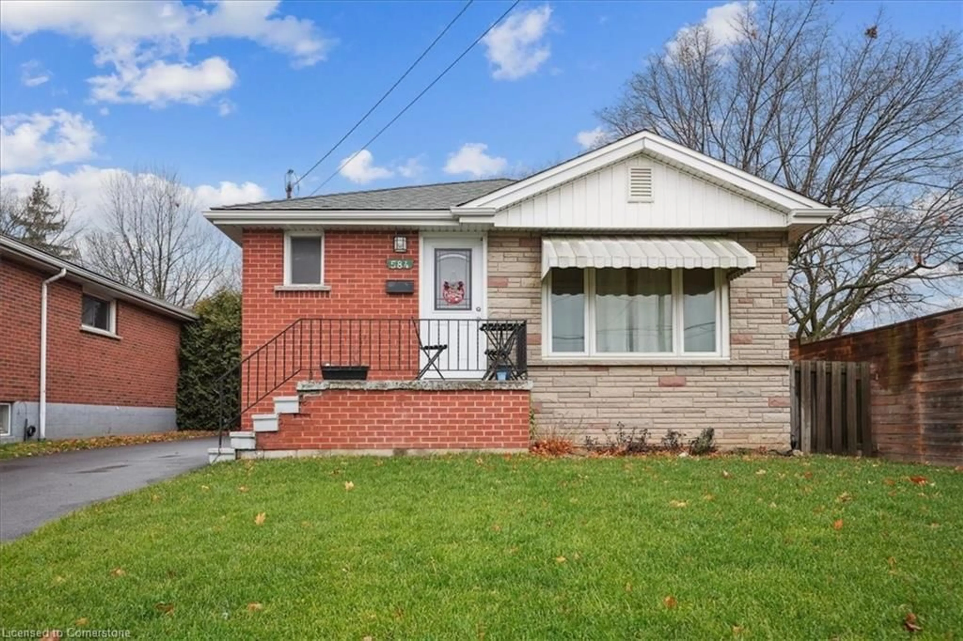 Home with brick exterior material, street for 584 East 27th St, Hamilton Ontario L8V 3H6