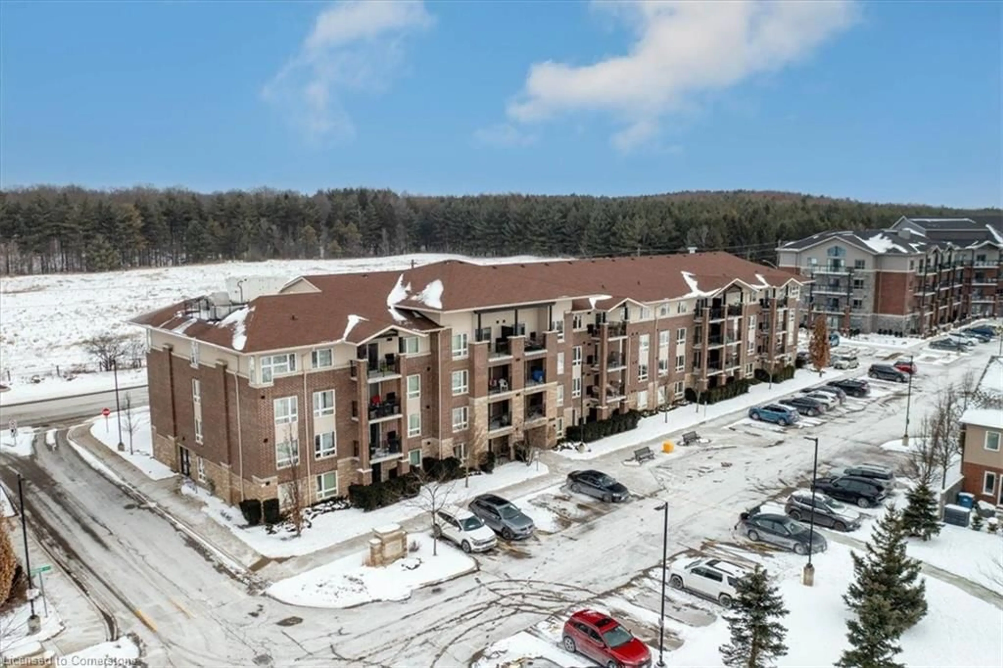 A pic from outside/outdoor area/front of a property/back of a property/a pic from drone, building for 45 Kingsbury Sq #310, Guelph Ontario N1L 0L2