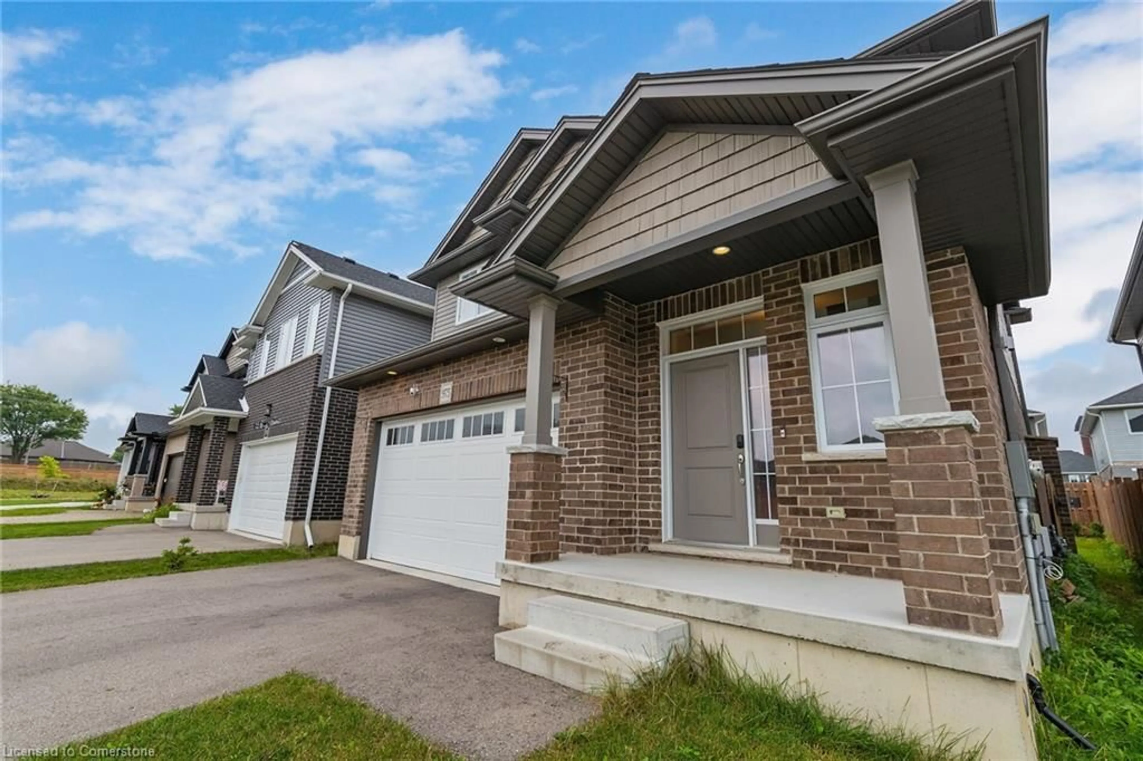 Home with brick exterior material, street for 975 Downing Dr, Woodstock Ontario N4T 0E1