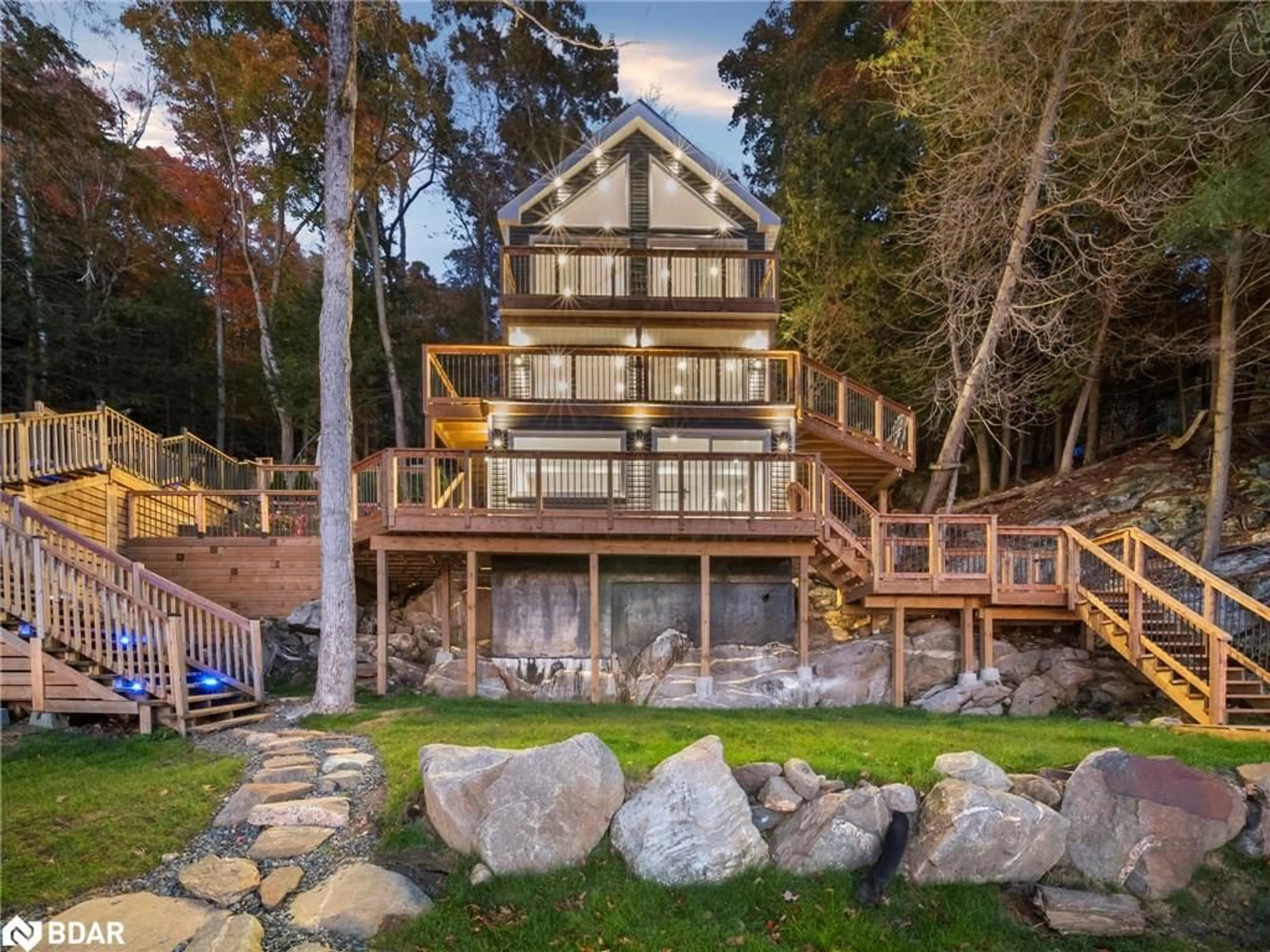 A pic from outside/outdoor area/front of a property/back of a property/a pic from drone, water/lake/river/ocean view for 62 Mill Lake Trail, McDougall Ontario P2A 2W9