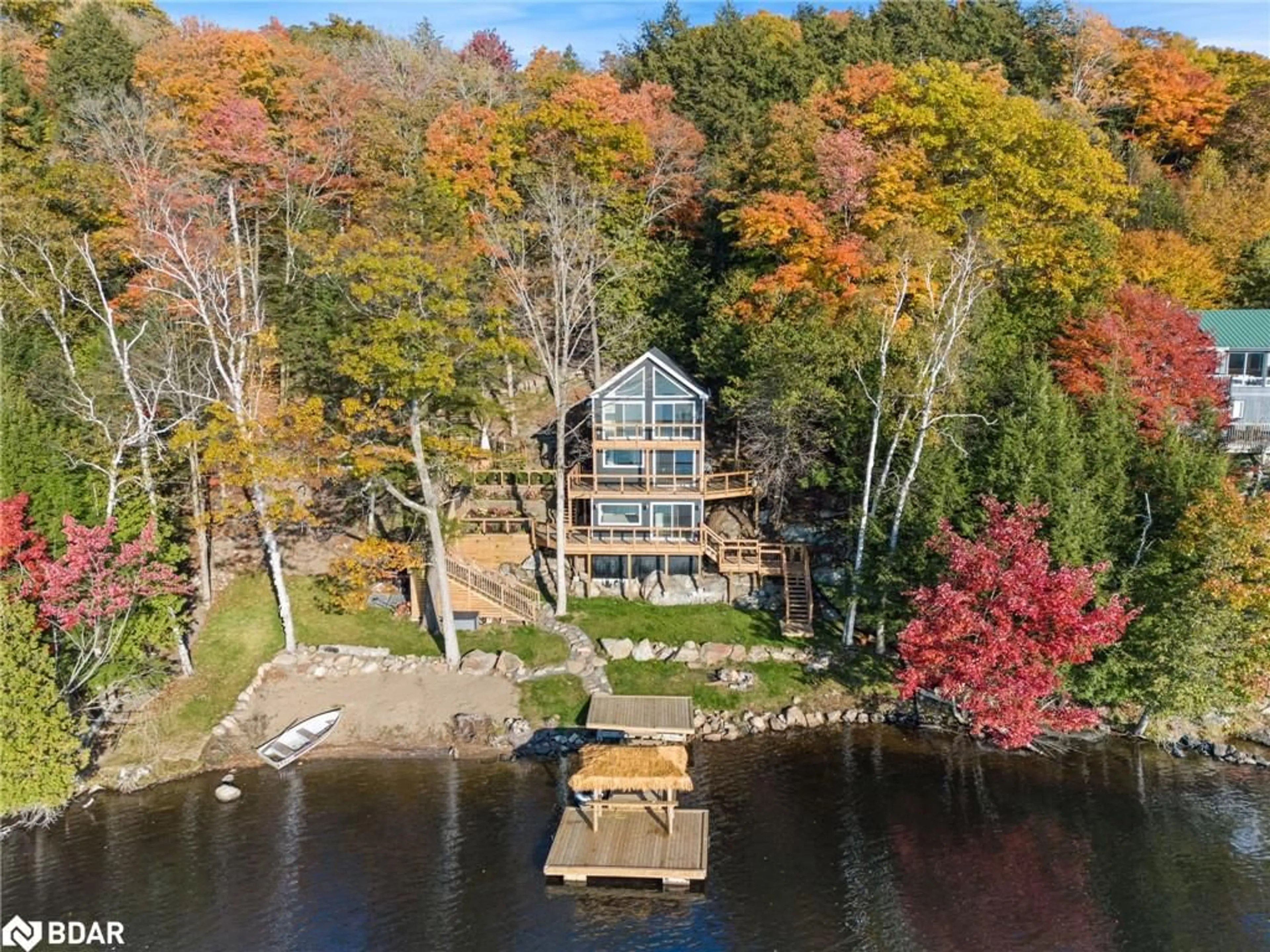 A pic from outside/outdoor area/front of a property/back of a property/a pic from drone, water/lake/river/ocean view for 62 Mill Lake Trail, McDougall Ontario P2A 2W9