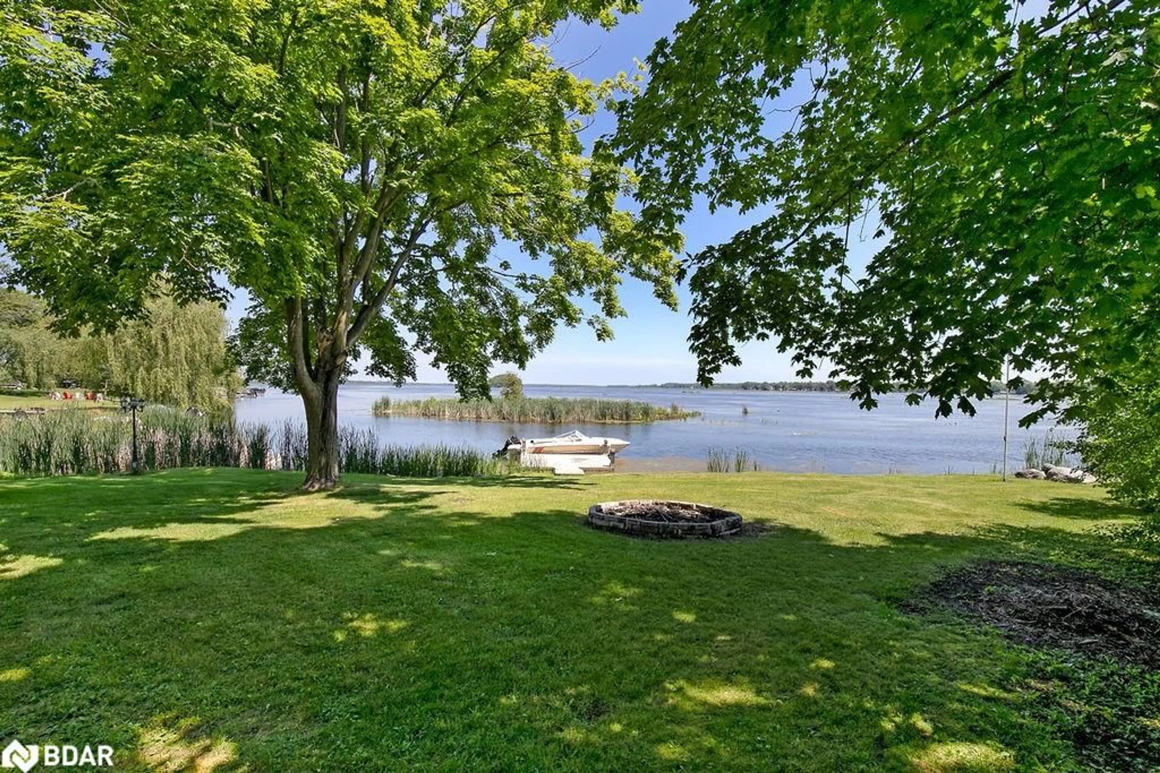 Patio, water/lake/river/ocean view for 24 Butternut Dr, Lindsay Ontario K9V 4R1