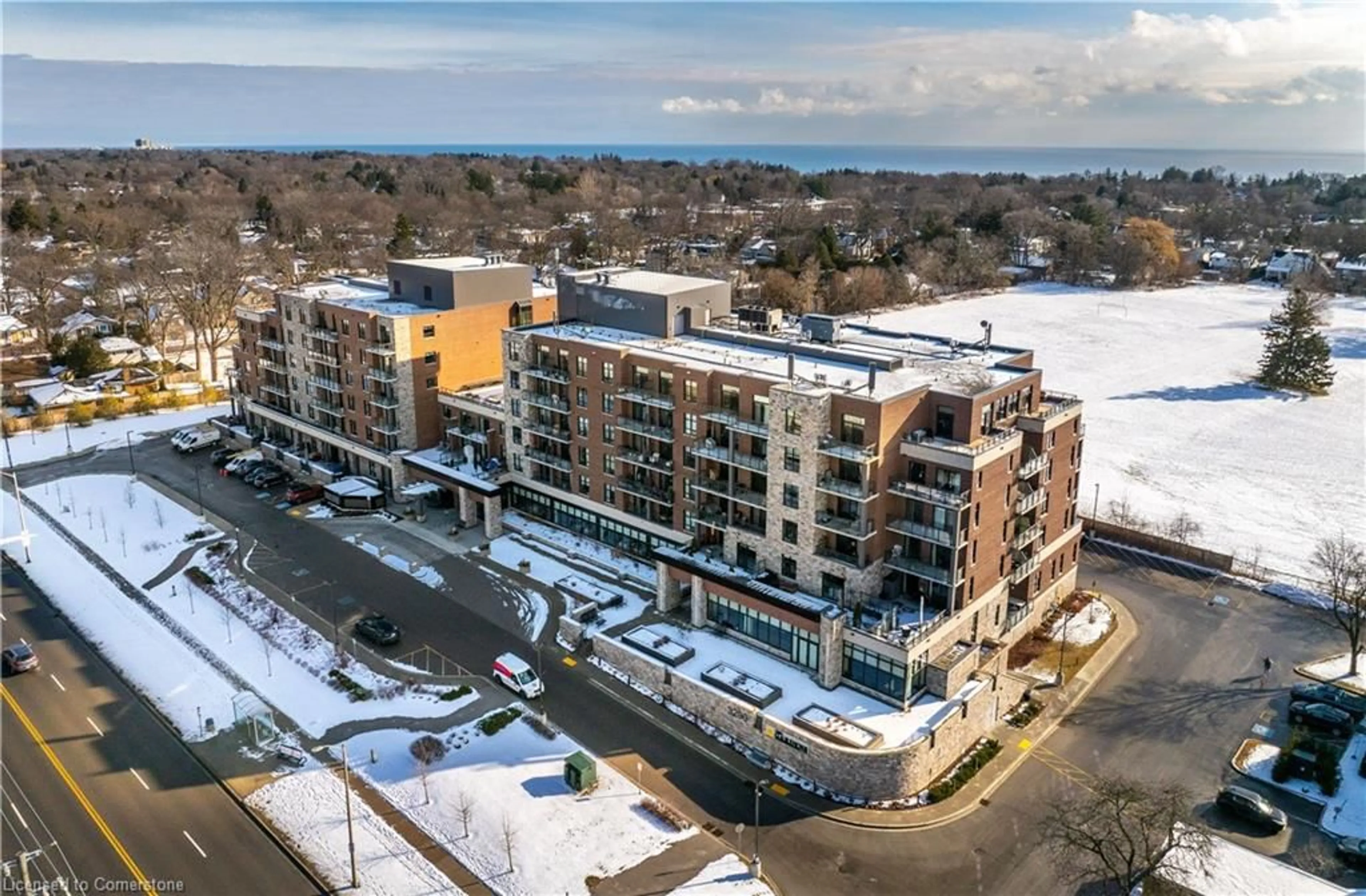 A pic from outside/outdoor area/front of a property/back of a property/a pic from drone, building for 3290 New St #214, Halton Ontario L7N 1M8