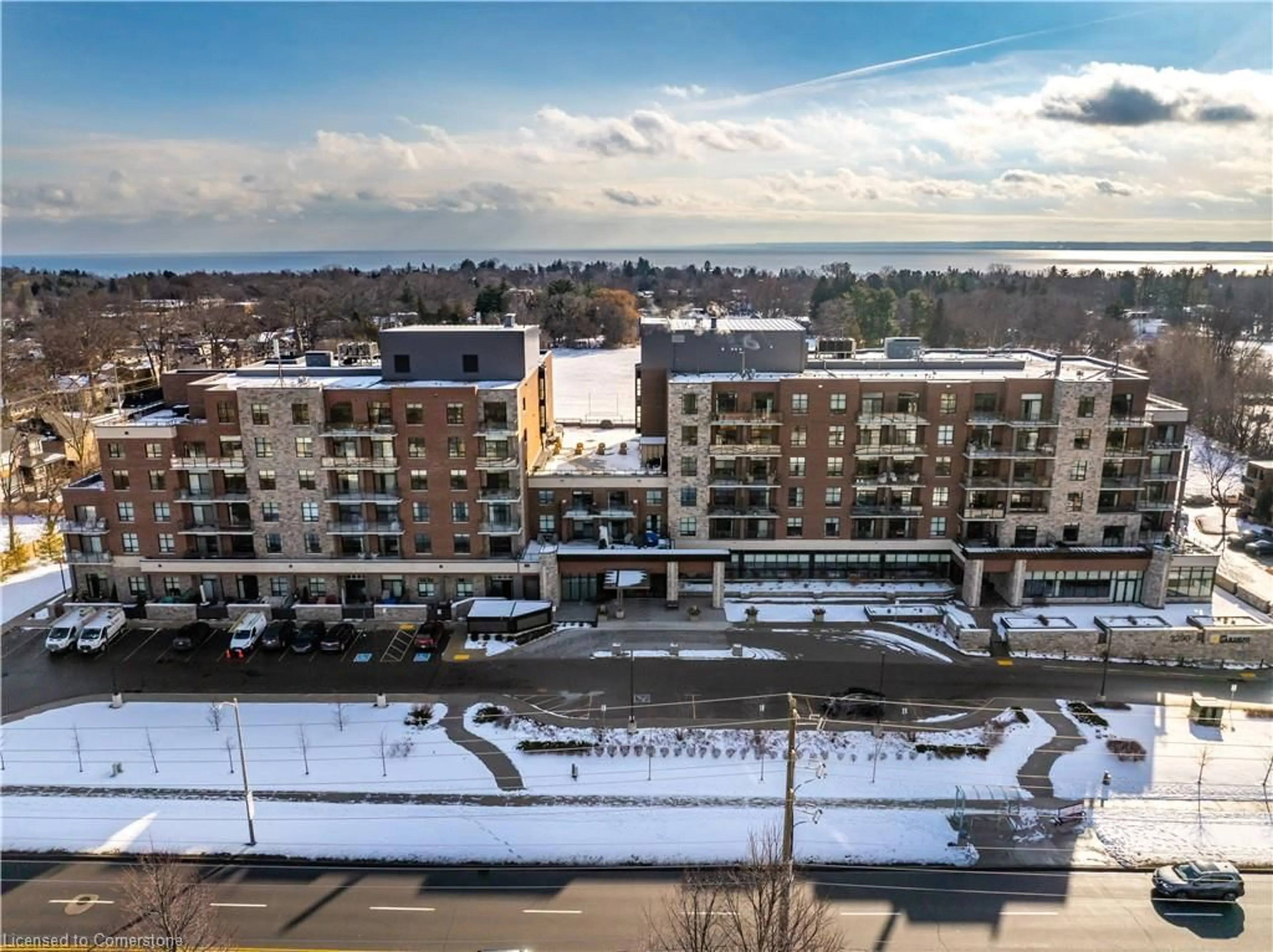 A pic from outside/outdoor area/front of a property/back of a property/a pic from drone, city buildings view from balcony for 3290 New St #214, Halton Ontario L7N 1M8