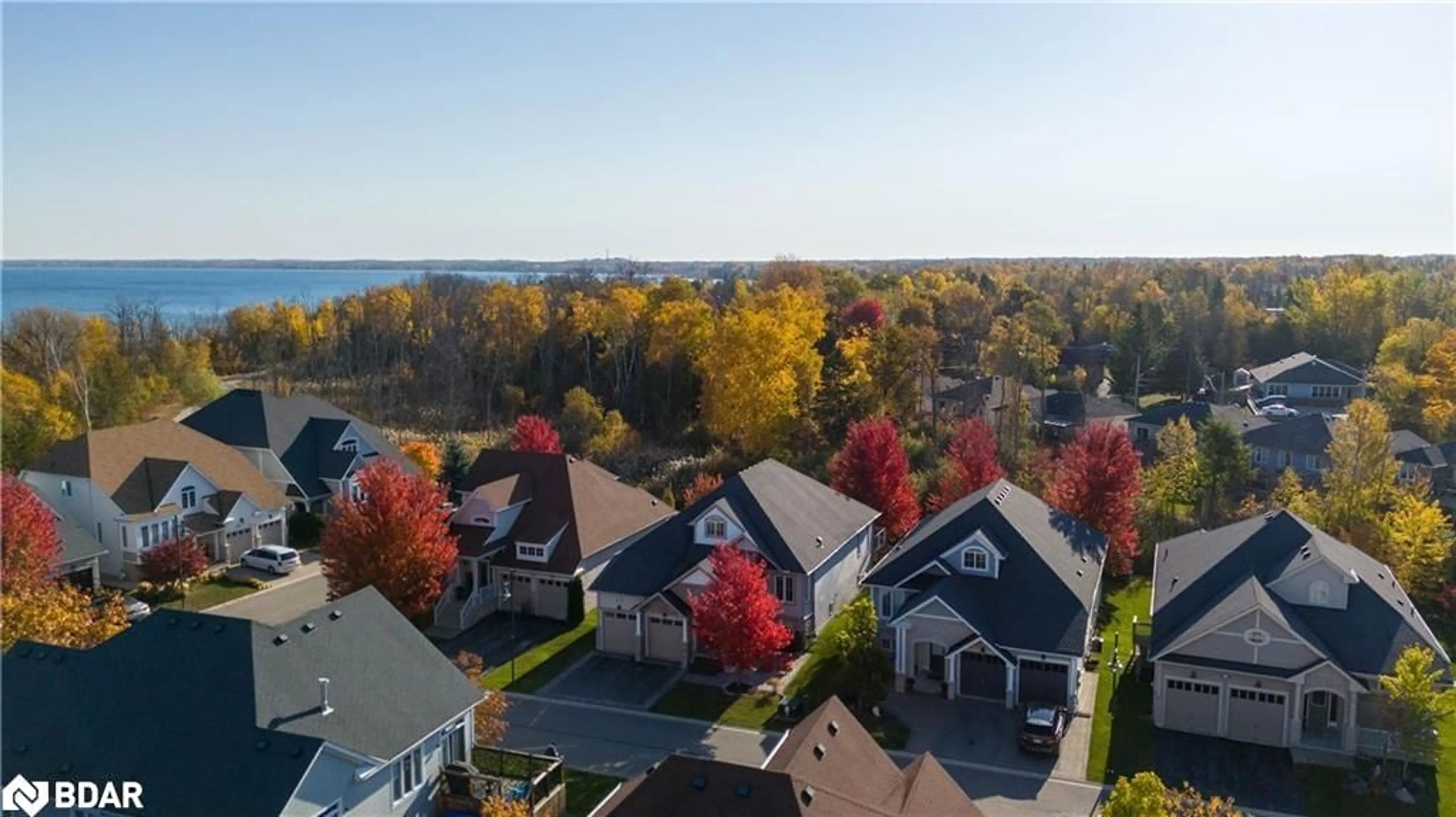 A pic from outside/outdoor area/front of a property/back of a property/a pic from drone, water/lake/river/ocean view for 44 Starboard Circle, Wasaga Beach Ontario L9Z 0E9