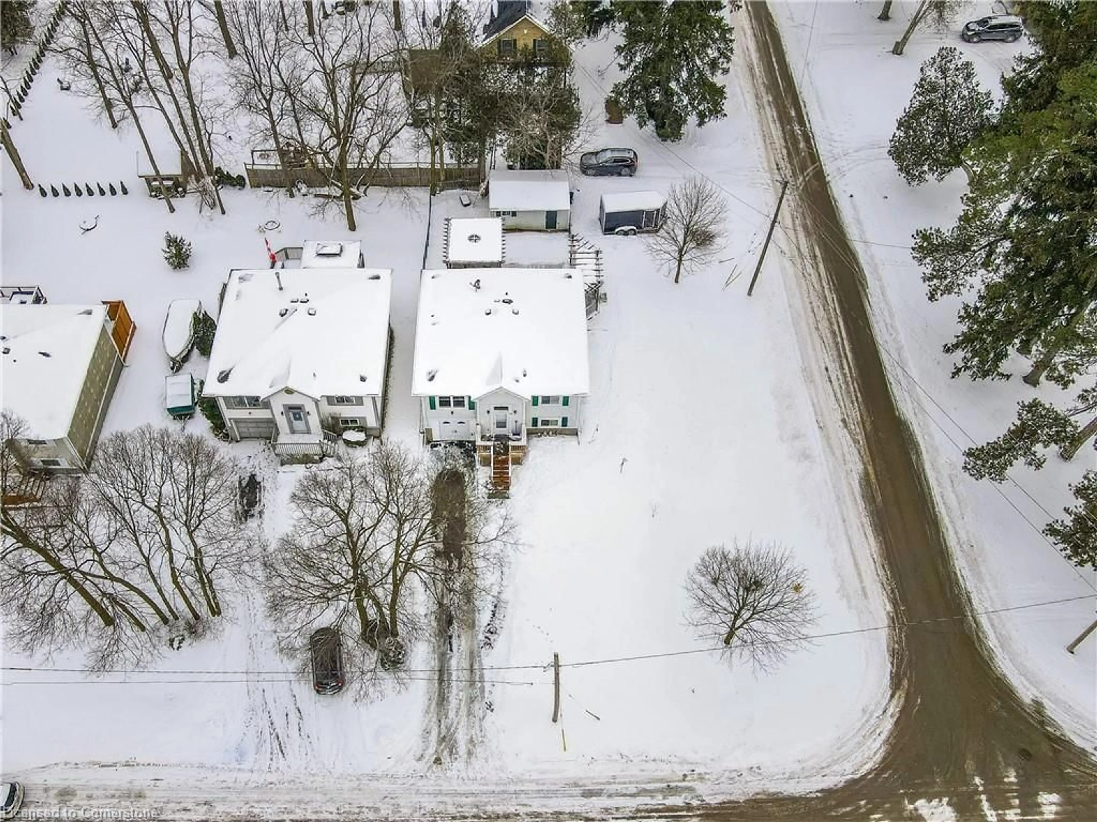 A pic from outside/outdoor area/front of a property/back of a property/a pic from drone, street for 56 Fennell St, Plattsville Ontario N0J 1S0