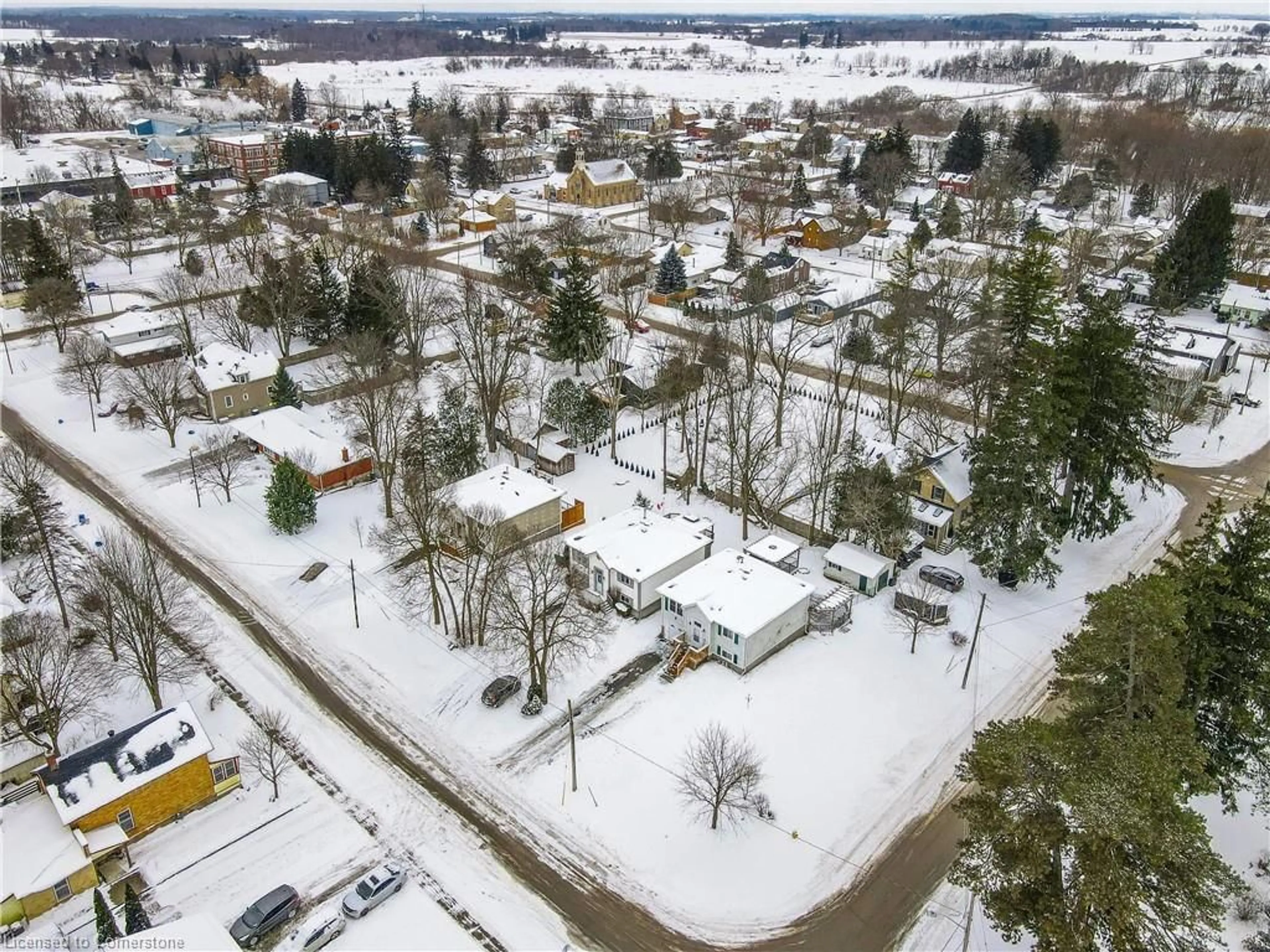 A pic from outside/outdoor area/front of a property/back of a property/a pic from drone, street for 56 Fennell St, Plattsville Ontario N0J 1S0