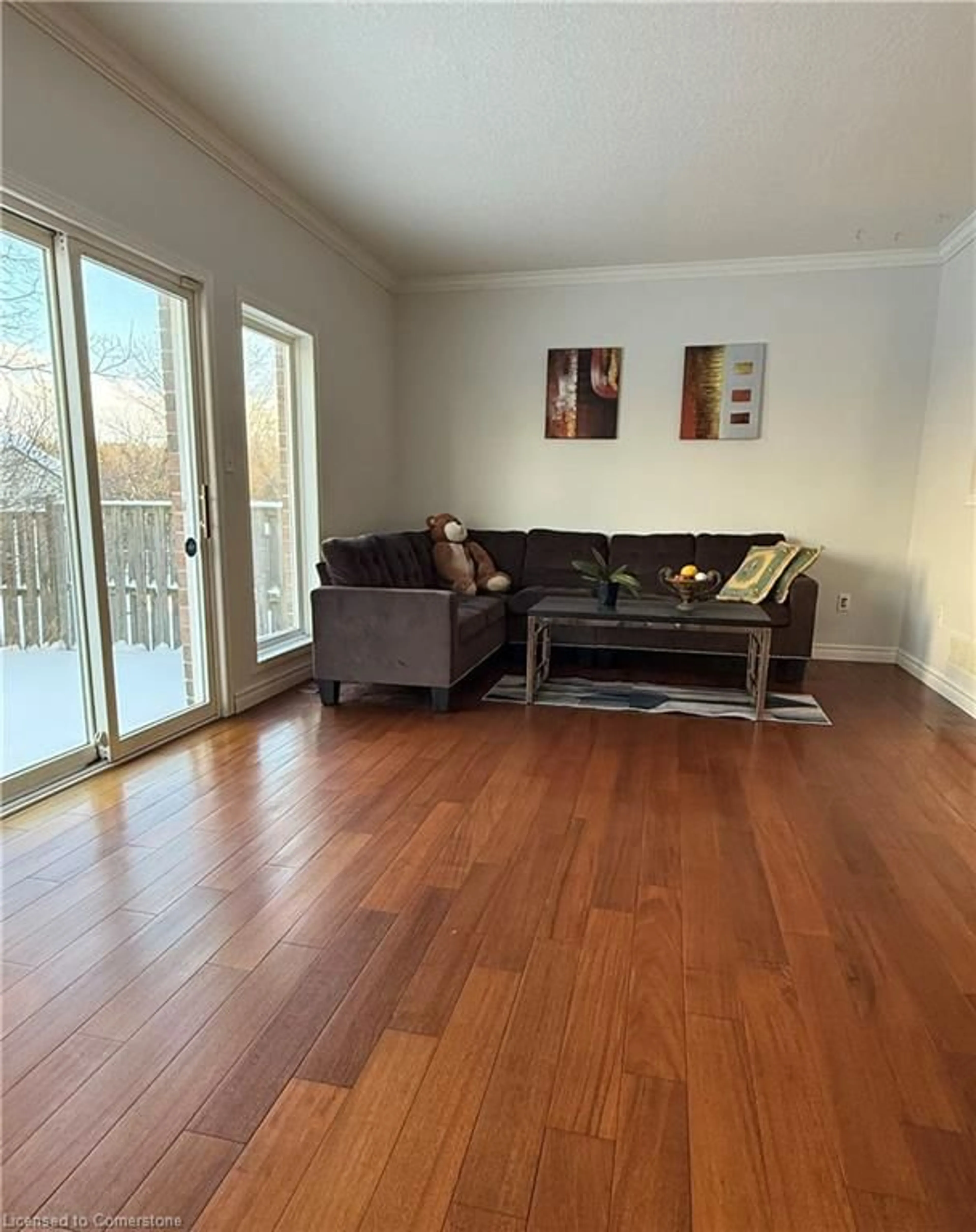 Living room with furniture, wood/laminate floor for 187 Pineland Crt, Waterloo Ontario N2T 2T2