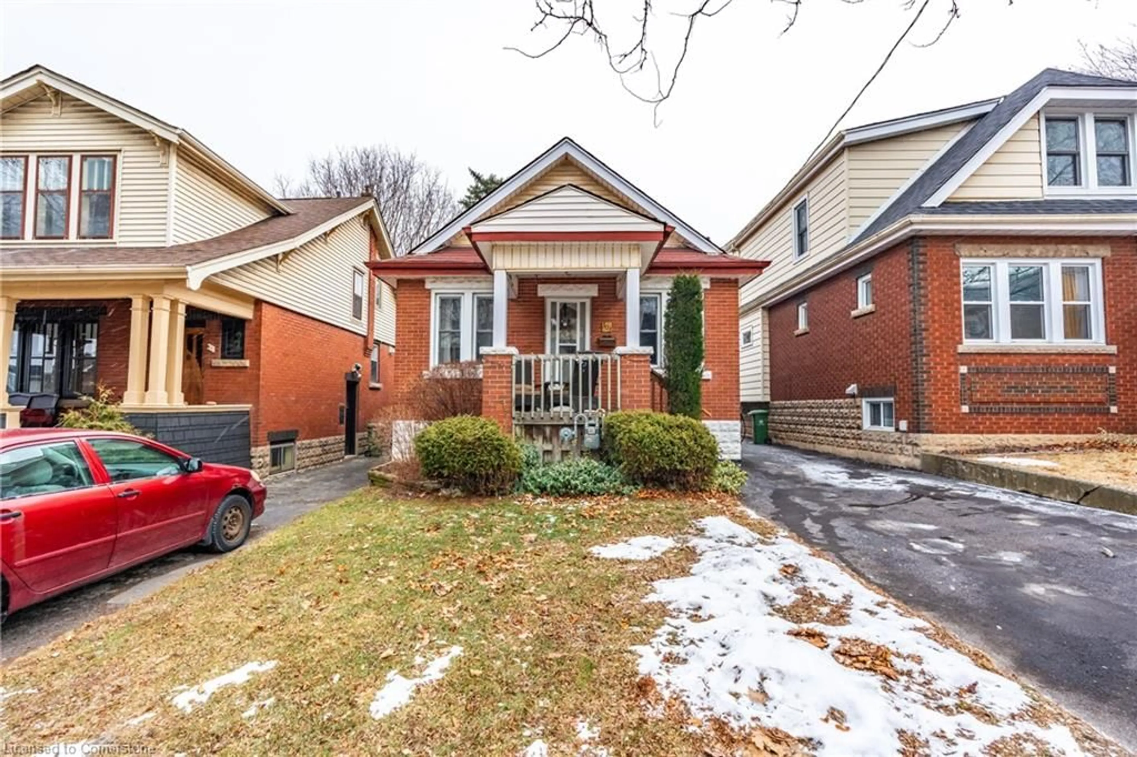 Home with brick exterior material, street for 303 Houghton Ave, Hamilton Ontario L8K 2N4