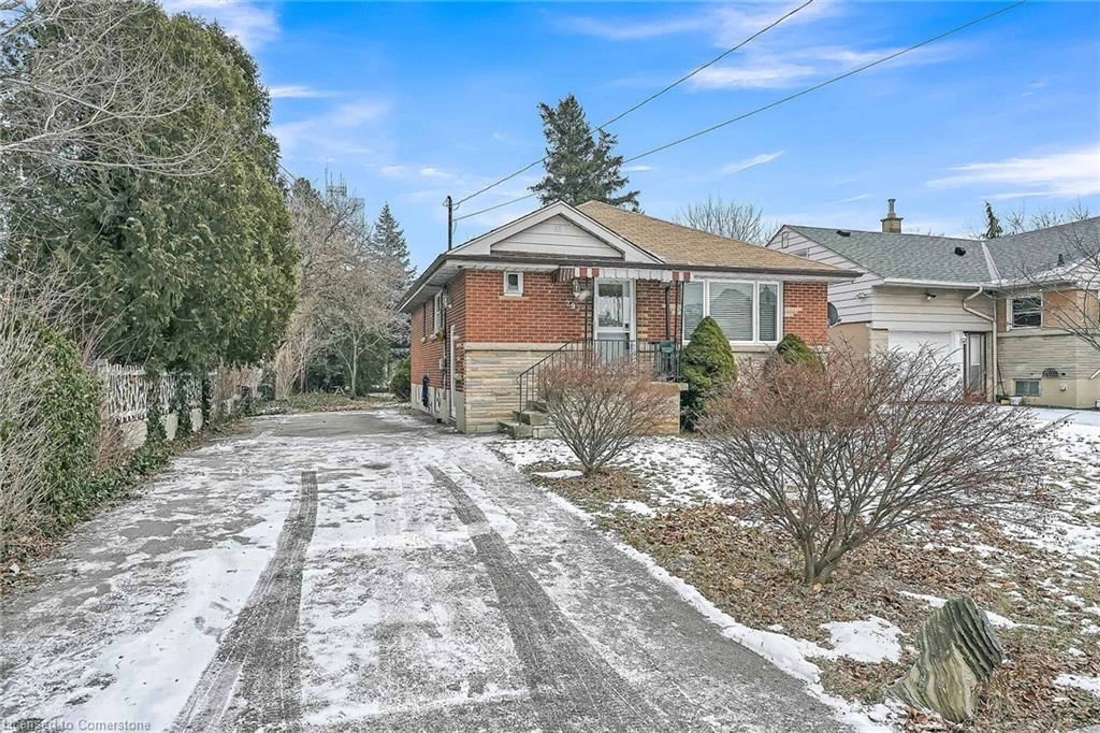 Home with brick exterior material, street for 297 East 36th St, Hamilton Ontario L8V 3Z7