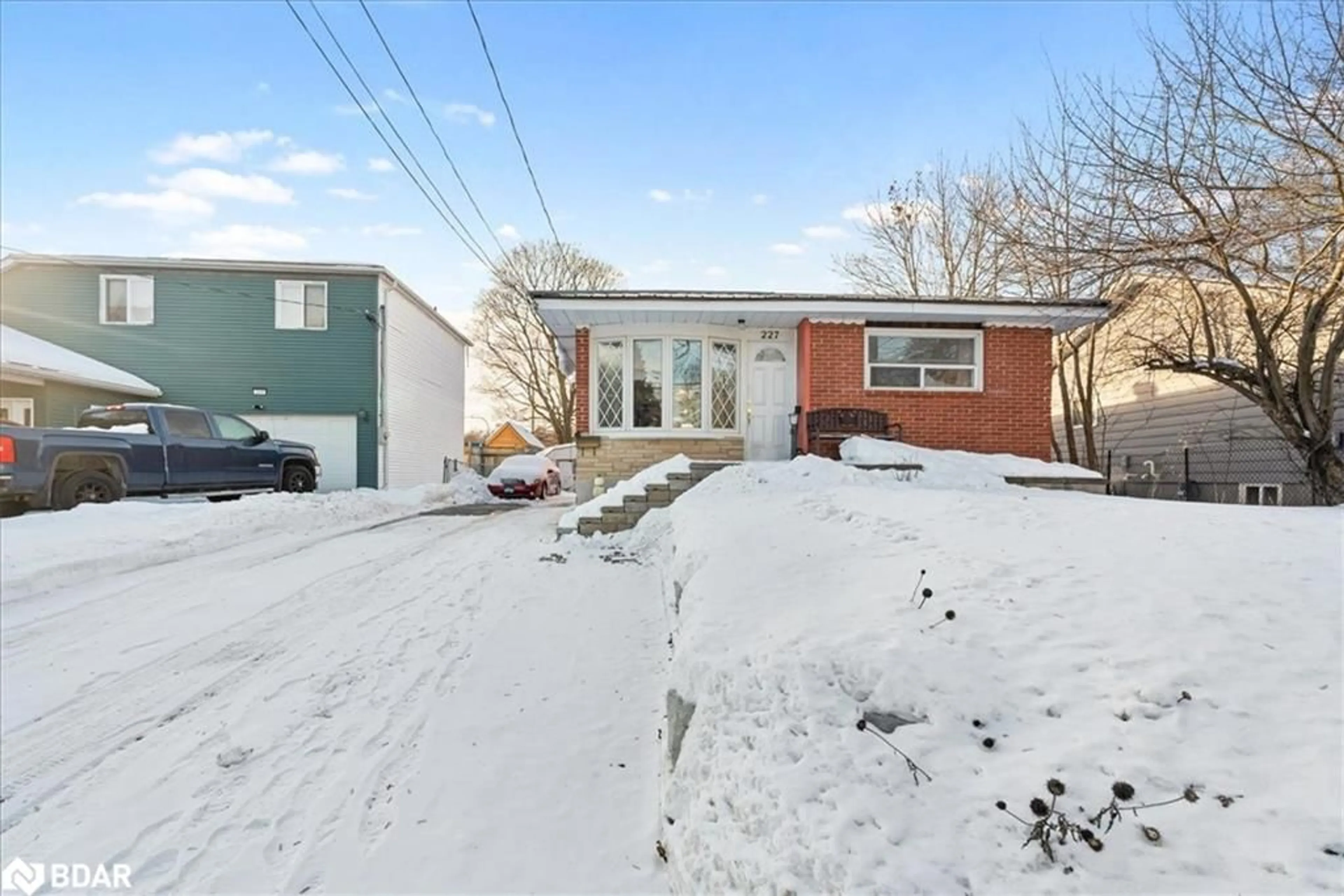 A pic from outside/outdoor area/front of a property/back of a property/a pic from drone, street for 227 Southview Rd, Barrie Ontario L4N 3X6