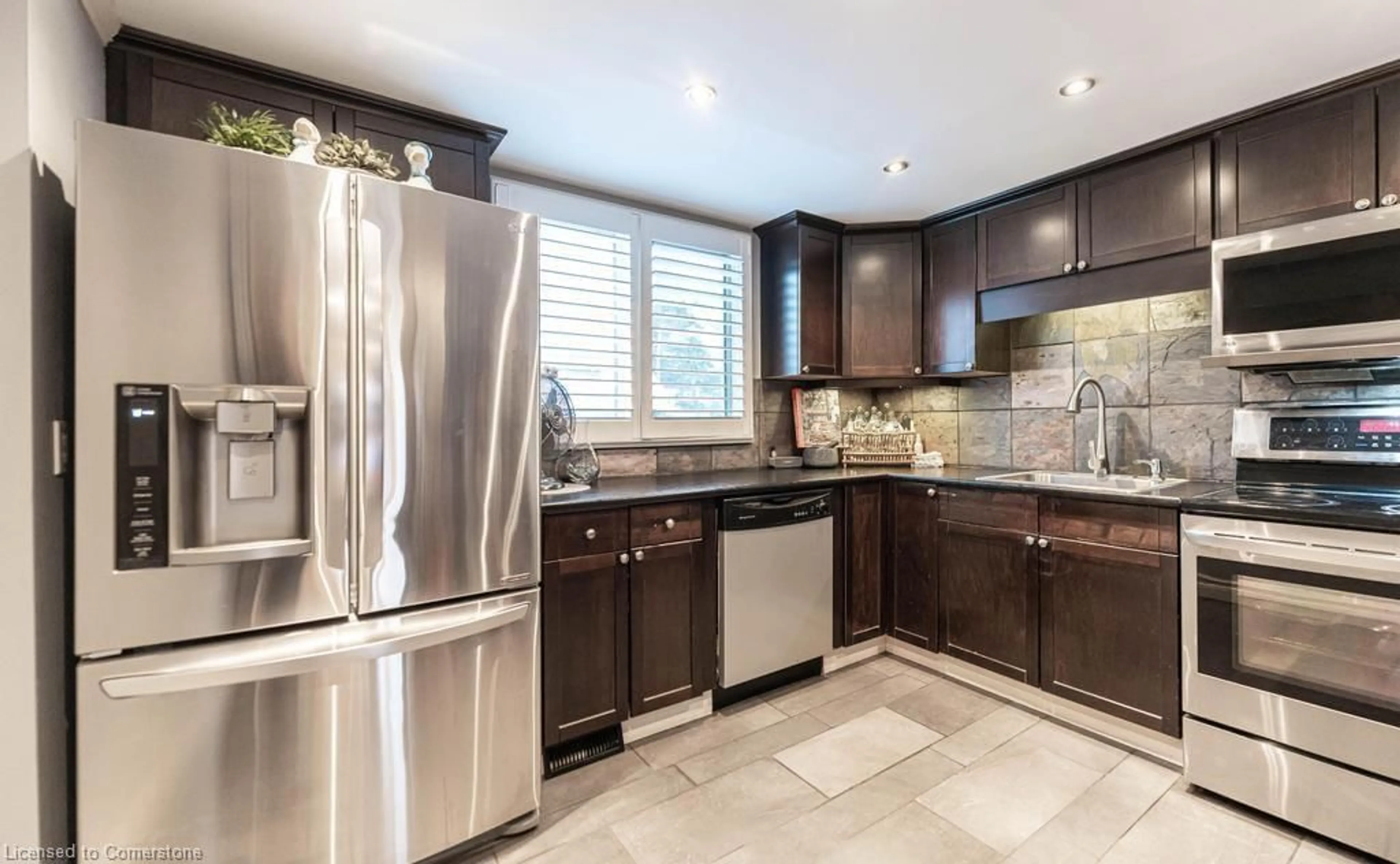 Contemporary kitchen, ceramic/tile floor for 178 Scott St #32, St. Catharines Ontario L2N 6Y5