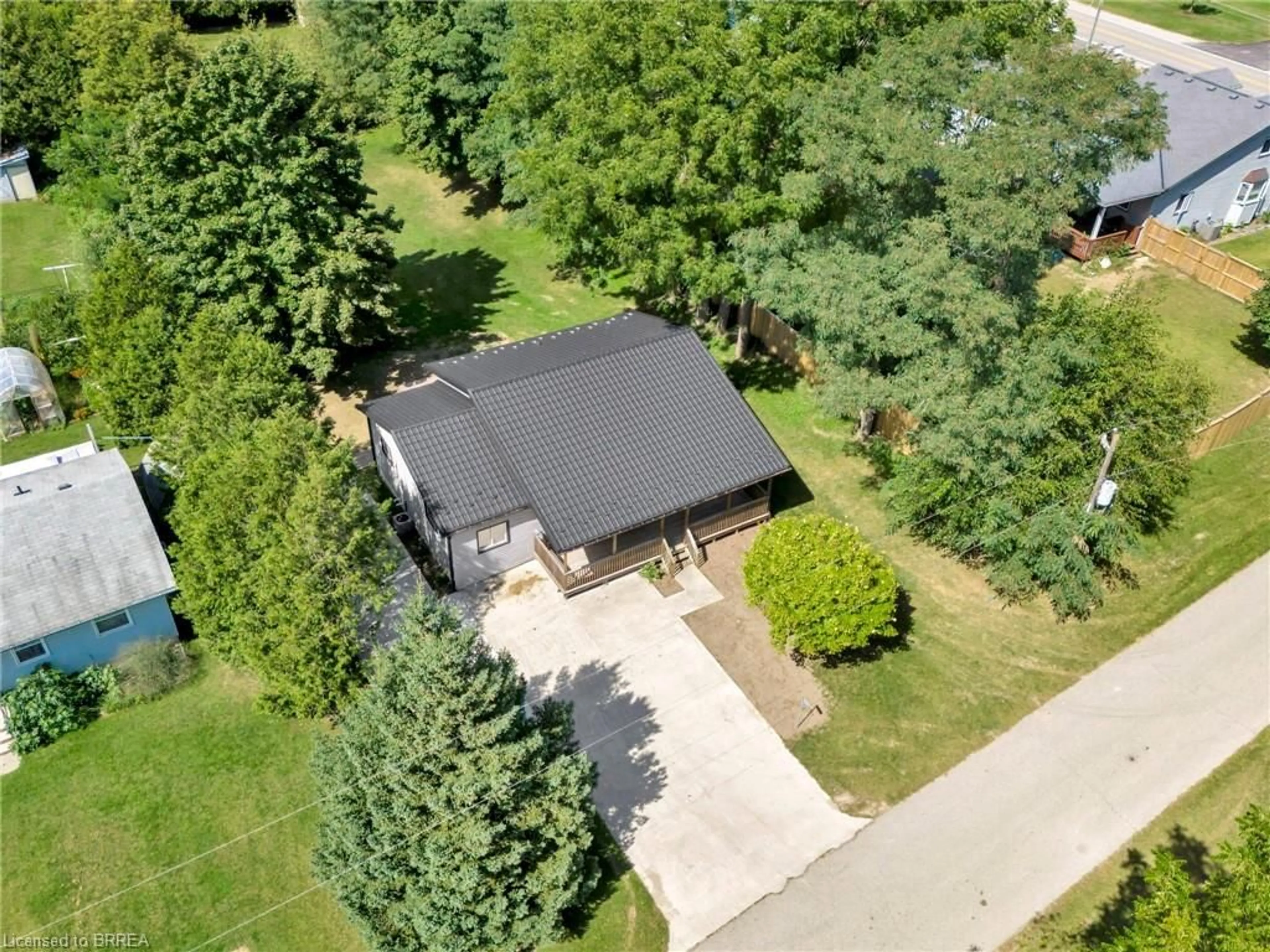 A pic from outside/outdoor area/front of a property/back of a property/a pic from drone, street for 9377 Garner Rd, Straffordville Ontario N0J 1Y0