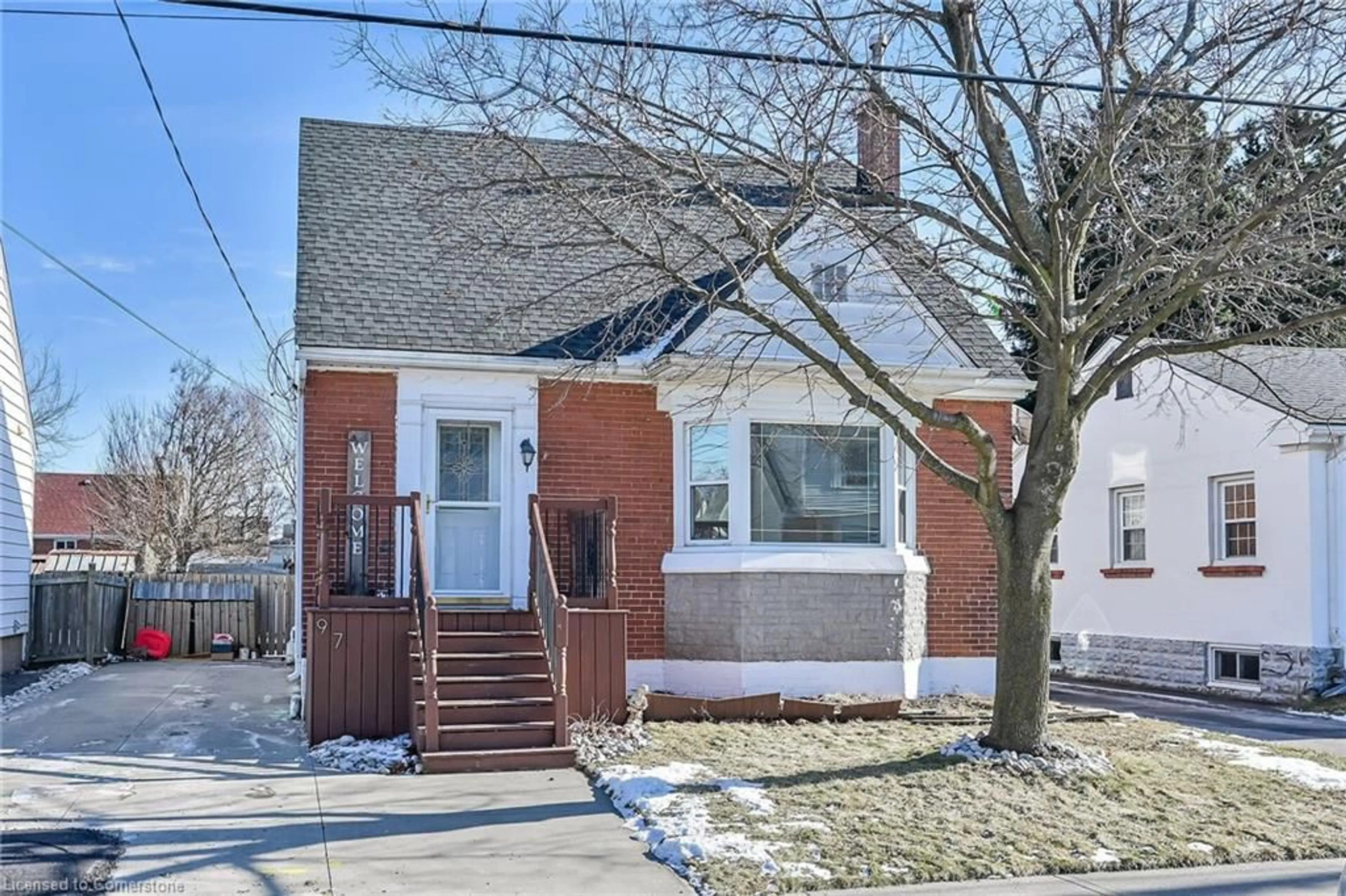 Home with brick exterior material, street for 97 East 12th St, Hamilton Ontario L9A 3X3