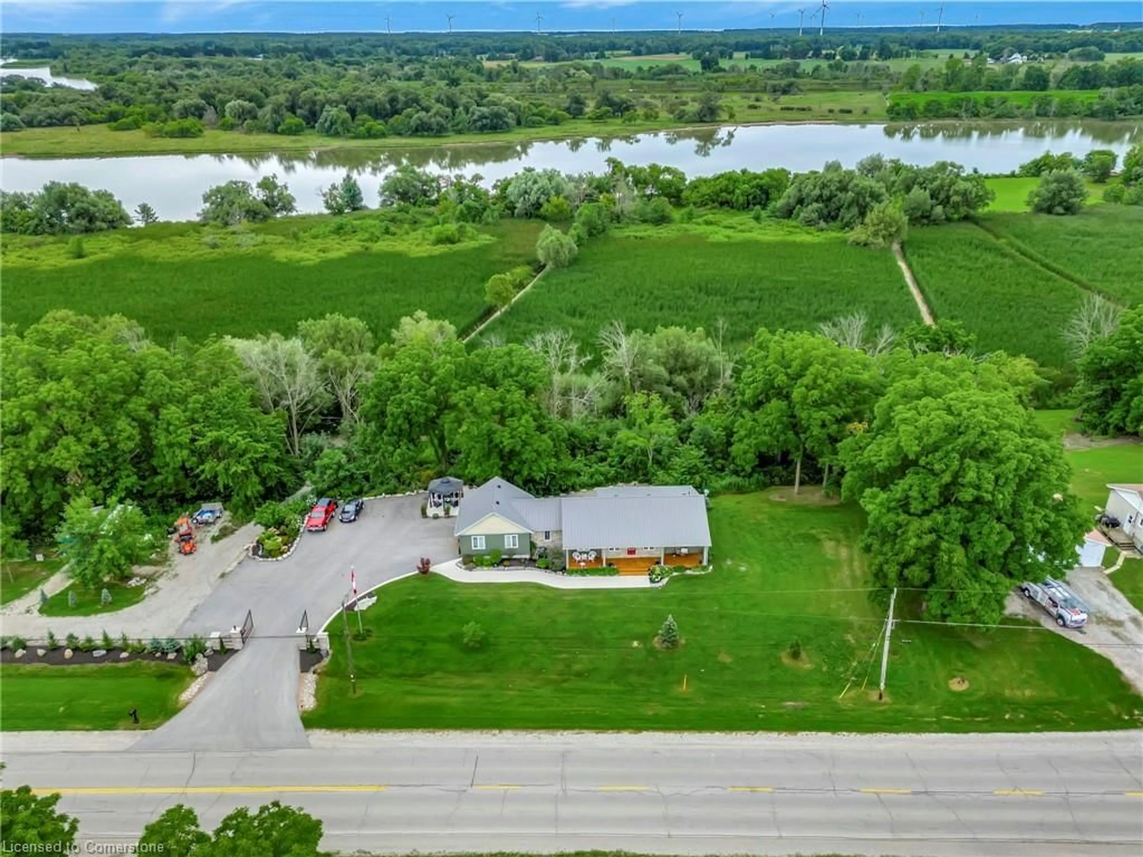 A pic from outside/outdoor area/front of a property/back of a property/a pic from drone, water/lake/river/ocean view for 571 Haldimand Road 17 Rd, Dunnville Ontario N1A 2W4