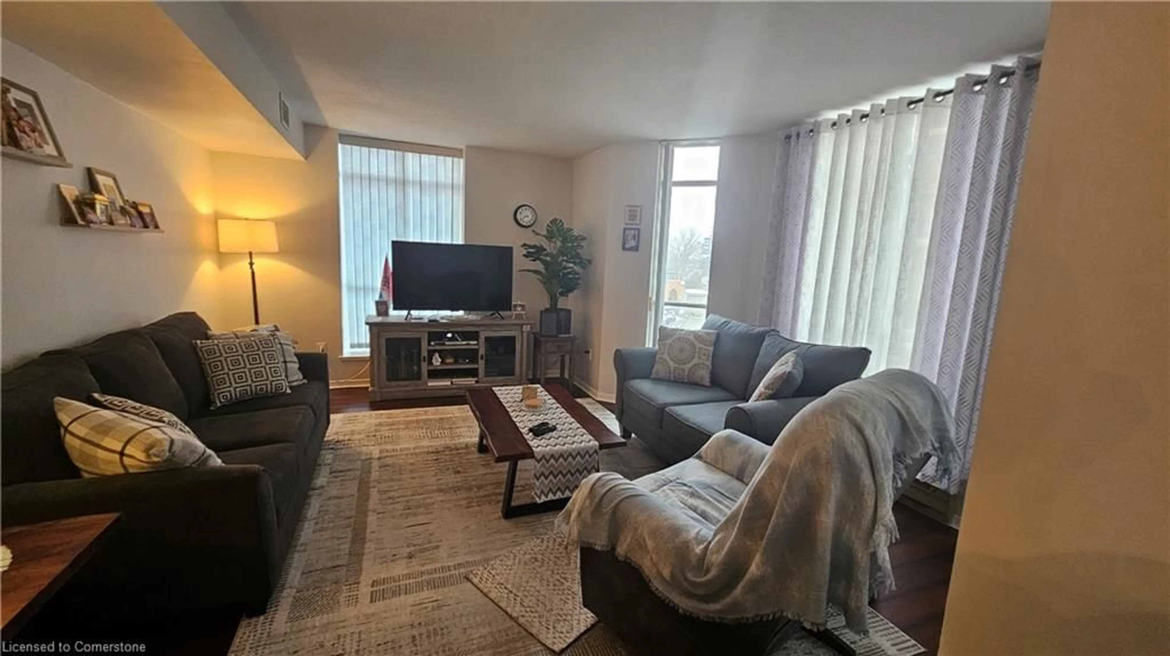 Living room with furniture, unknown for 1414 King St #206, Kitchener Ontario N2G 4T8