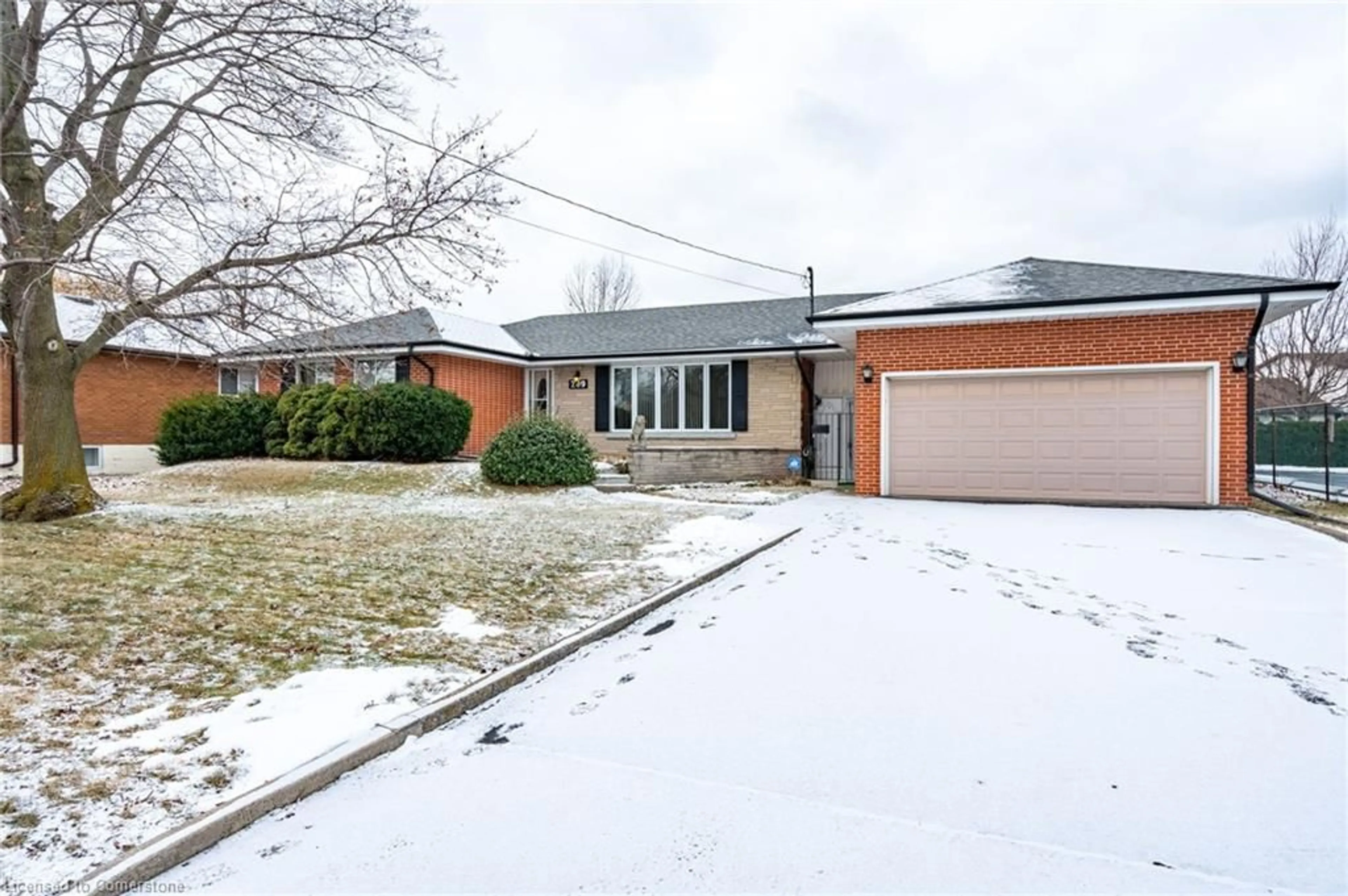 Home with brick exterior material, street for 209 Nash Rd, Hamilton Ontario L8H 2P8