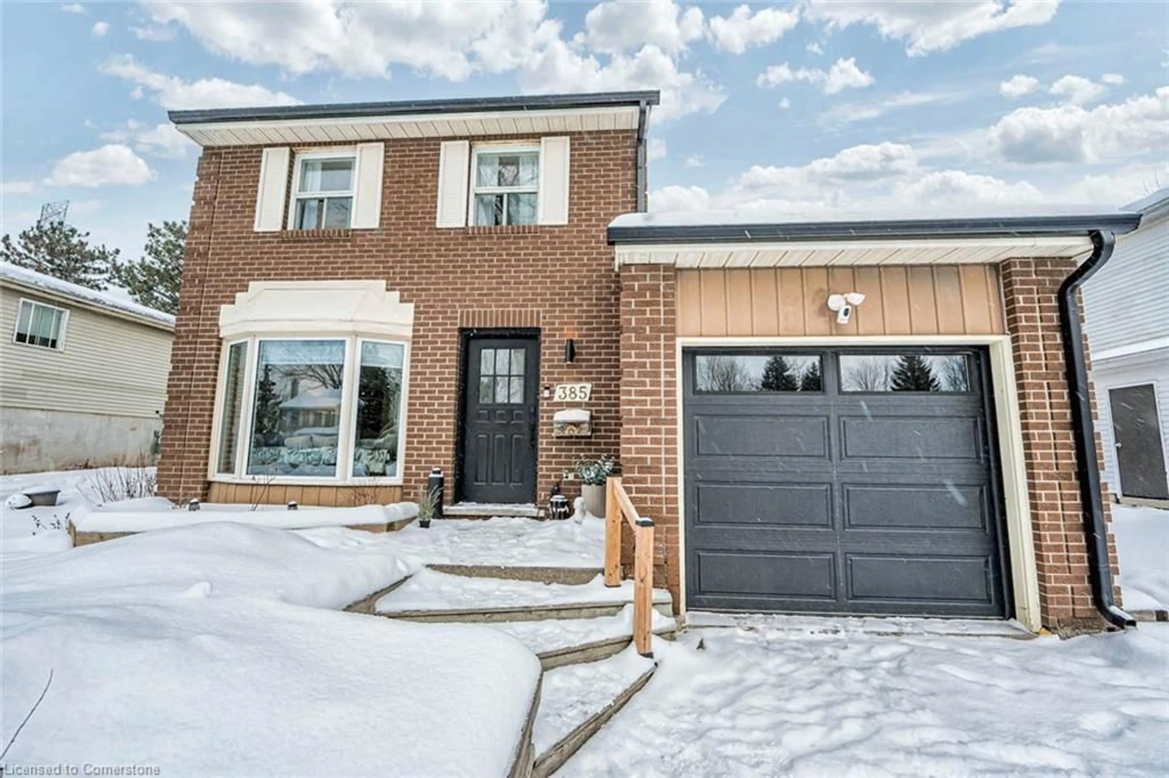 Home with brick exterior material, street for 385 Driftwood Dr, Kitchener Ontario N2N 2B1