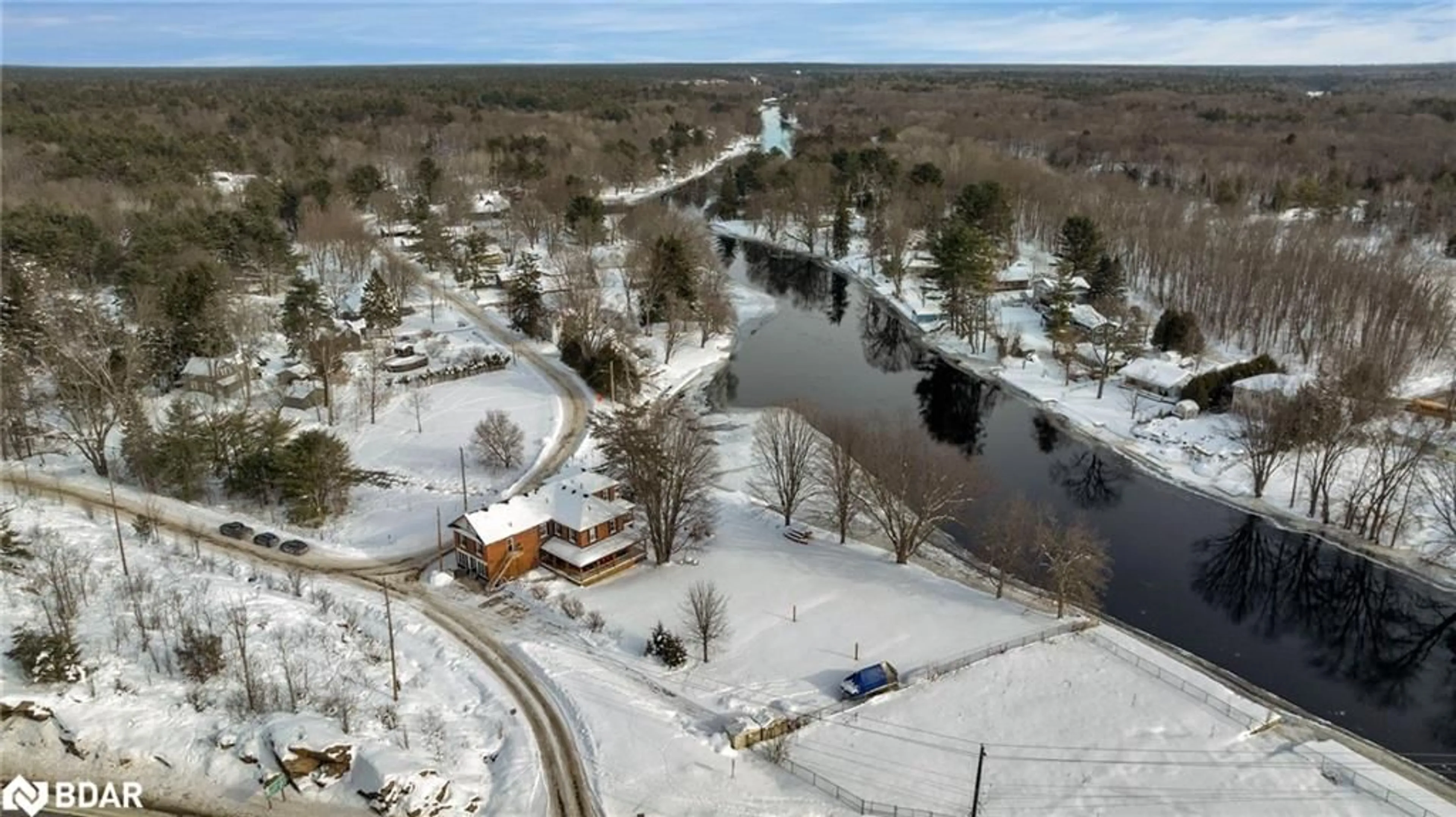 A pic from outside/outdoor area/front of a property/back of a property/a pic from drone, water/lake/river/ocean view for 1002 Cowbell Lane, Gravenhurst Ontario P0E 1N0