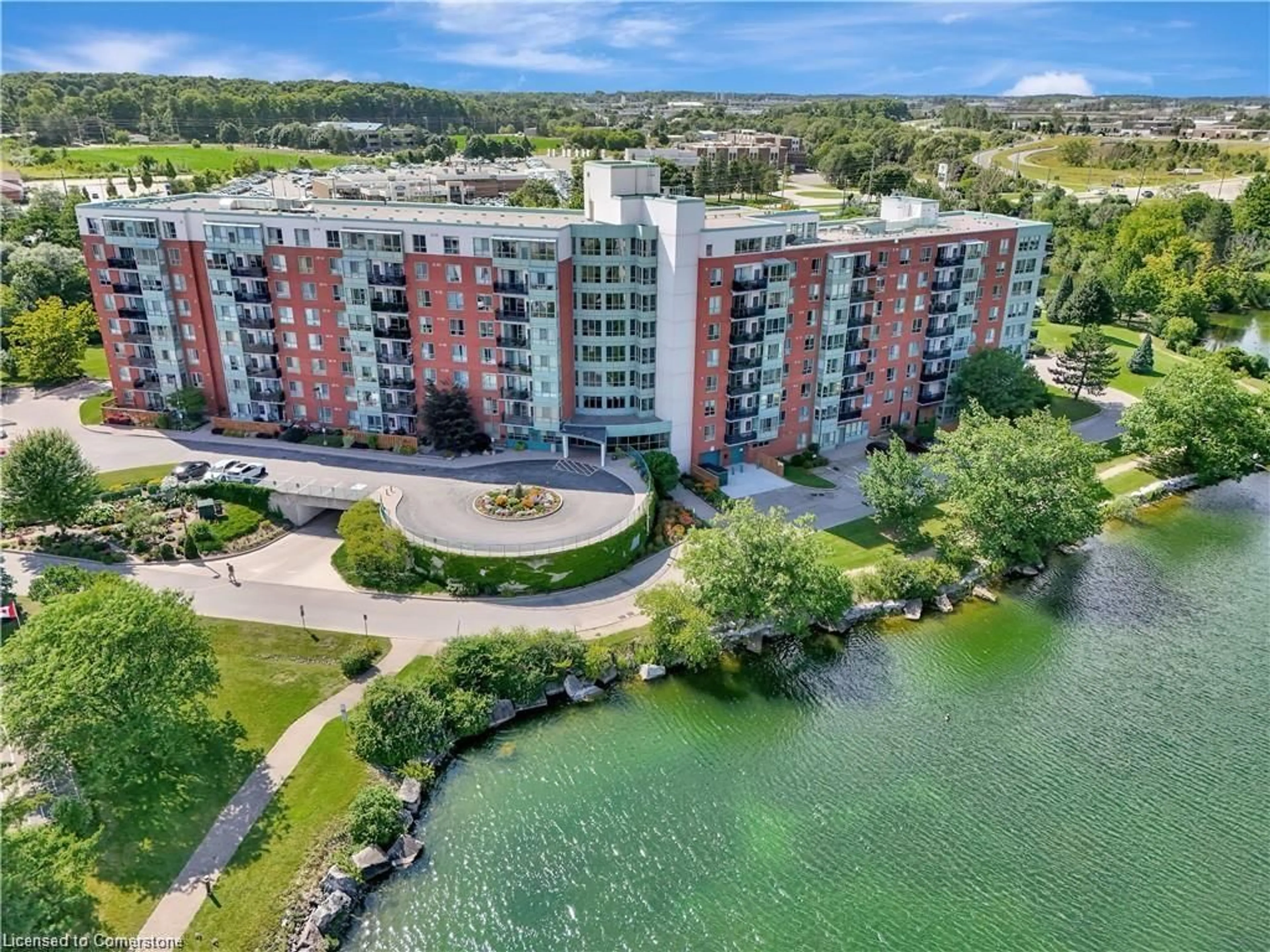 A pic from outside/outdoor area/front of a property/back of a property/a pic from drone, water/lake/river/ocean view for 30 Blue Springs Dr #416, Waterloo Ontario N2J 4T2