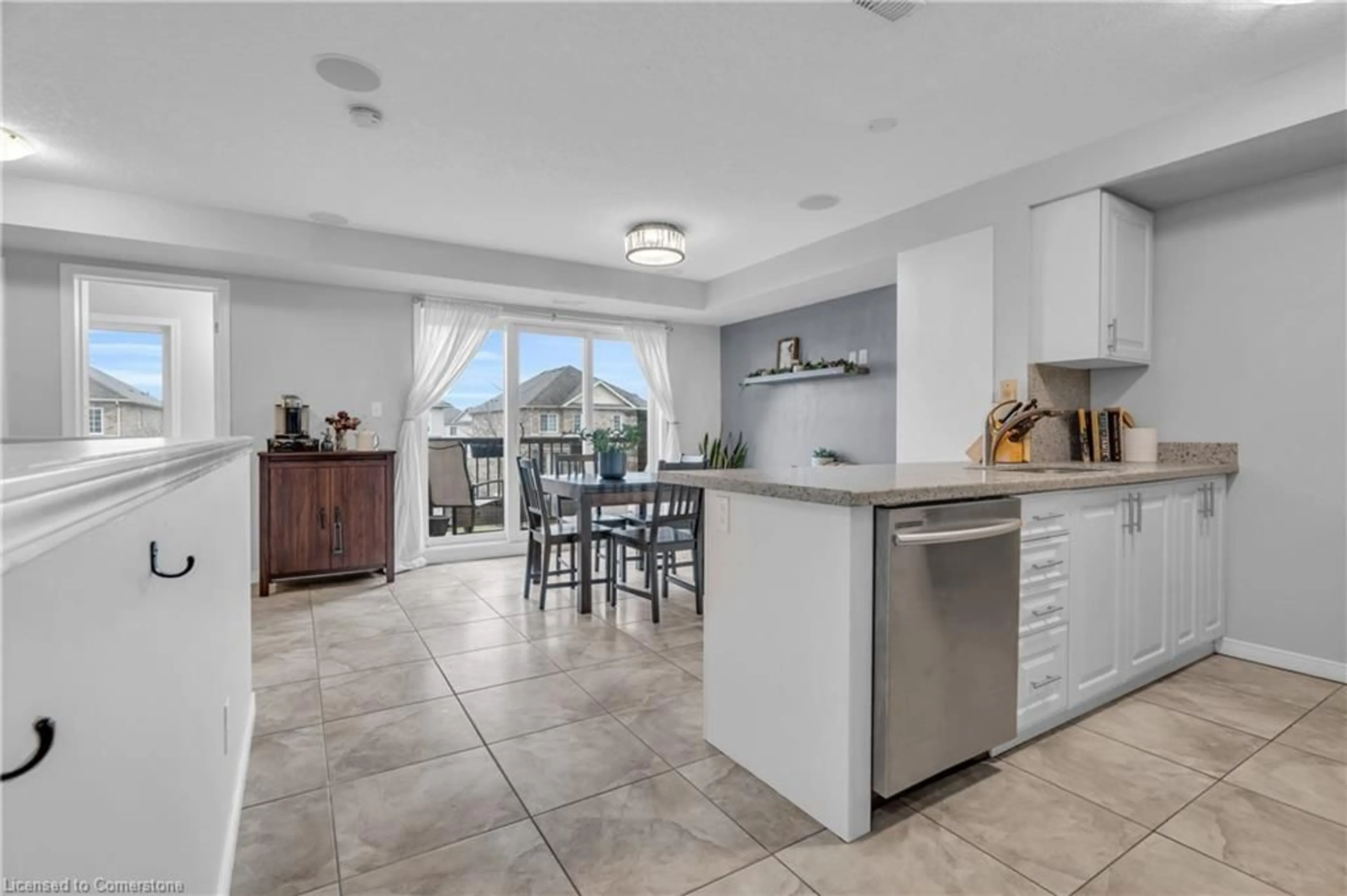 Open concept kitchen, ceramic/tile floor for 35 Mountford Dr #27, Guelph Ontario N1E 0G6