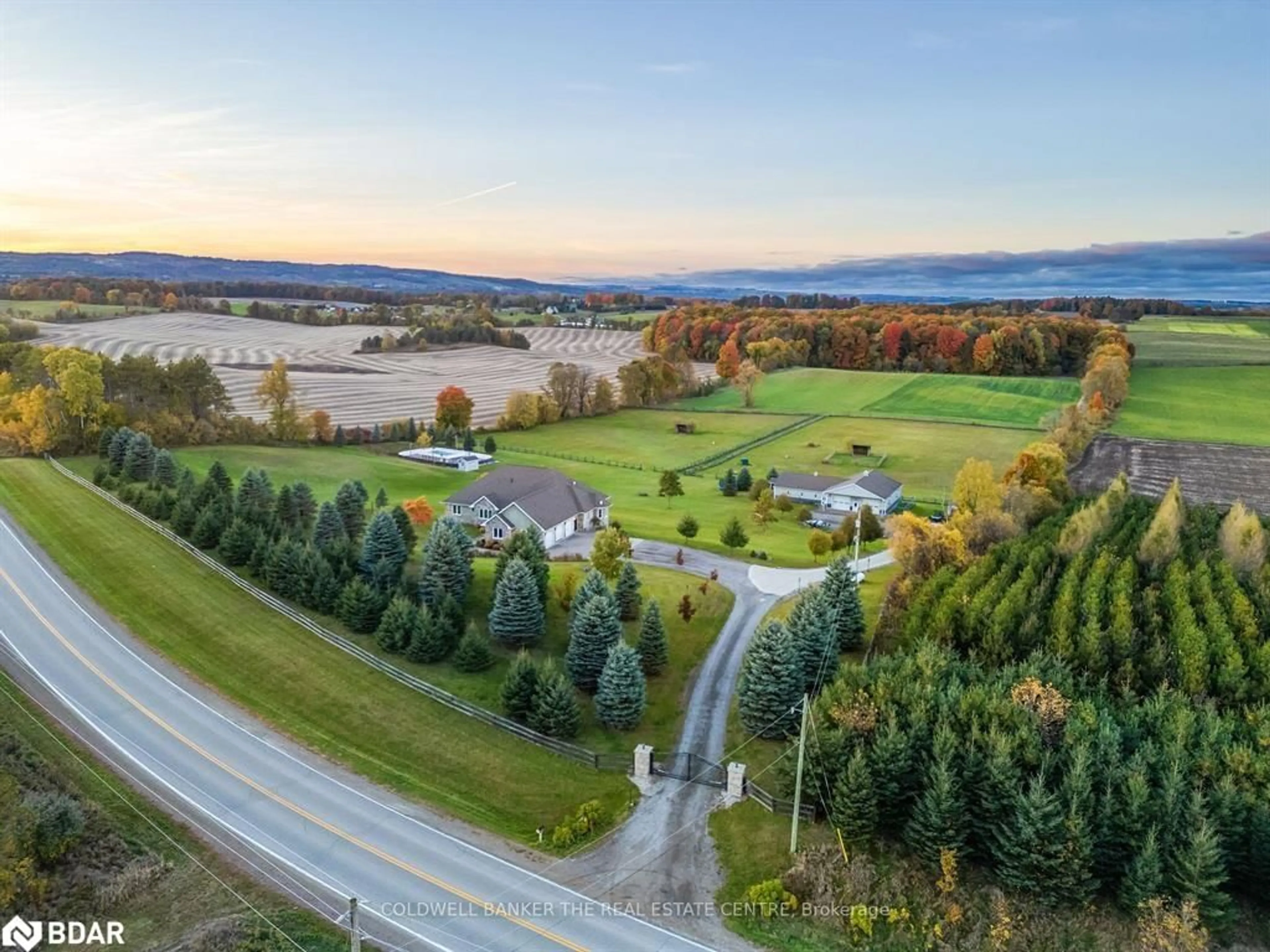 A pic from outside/outdoor area/front of a property/back of a property/a pic from drone, water/lake/river/ocean view for 708497 County Rd 21 Rd, Mulmur Ontario L0M 1M0