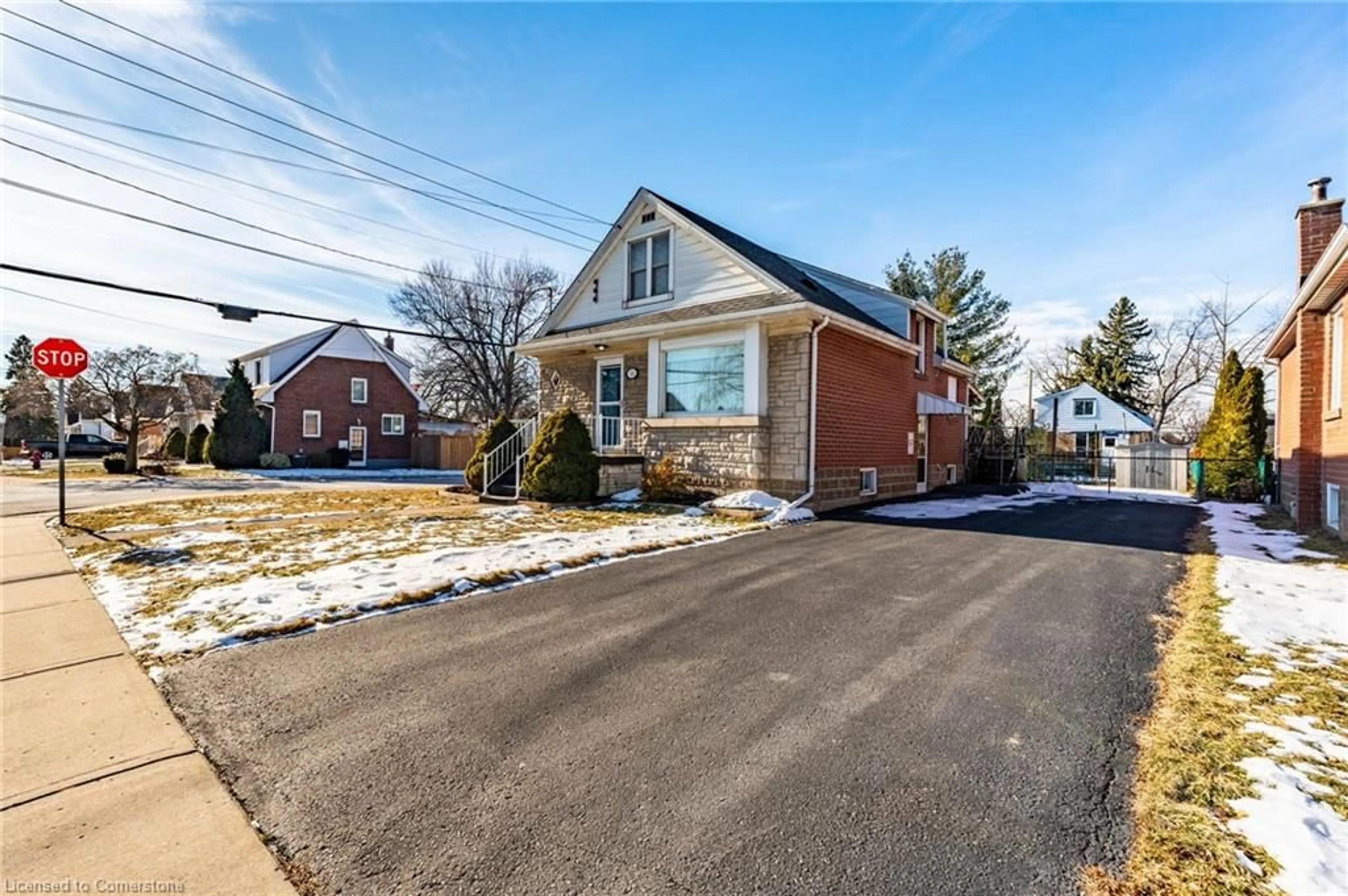 Home with brick exterior material, street for 56 West 1st St, Hamilton Ontario L9C 3C1