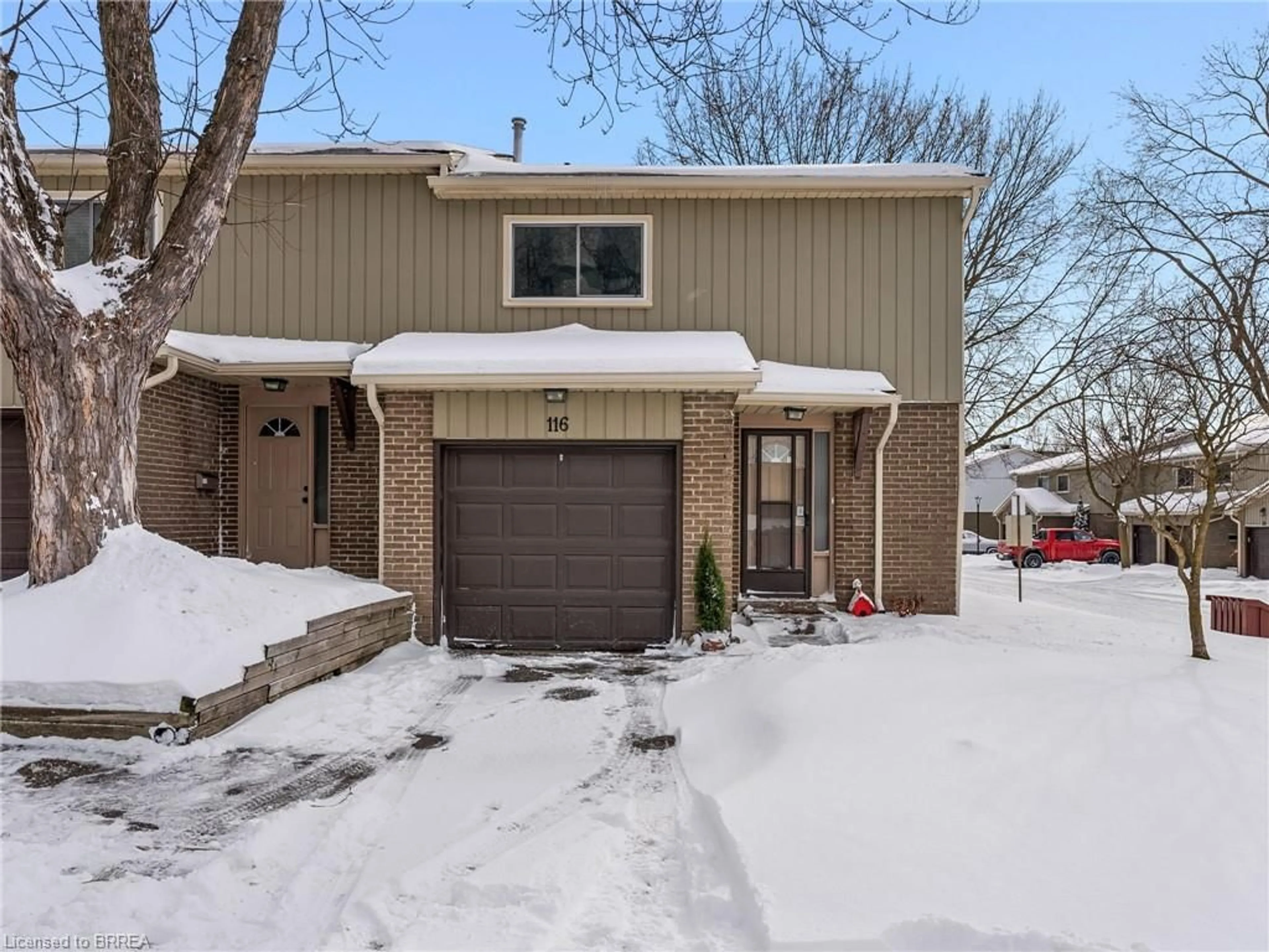 Home with brick exterior material, street for 51 Paulander Dr #116, Kitchener Ontario N2M 5E5