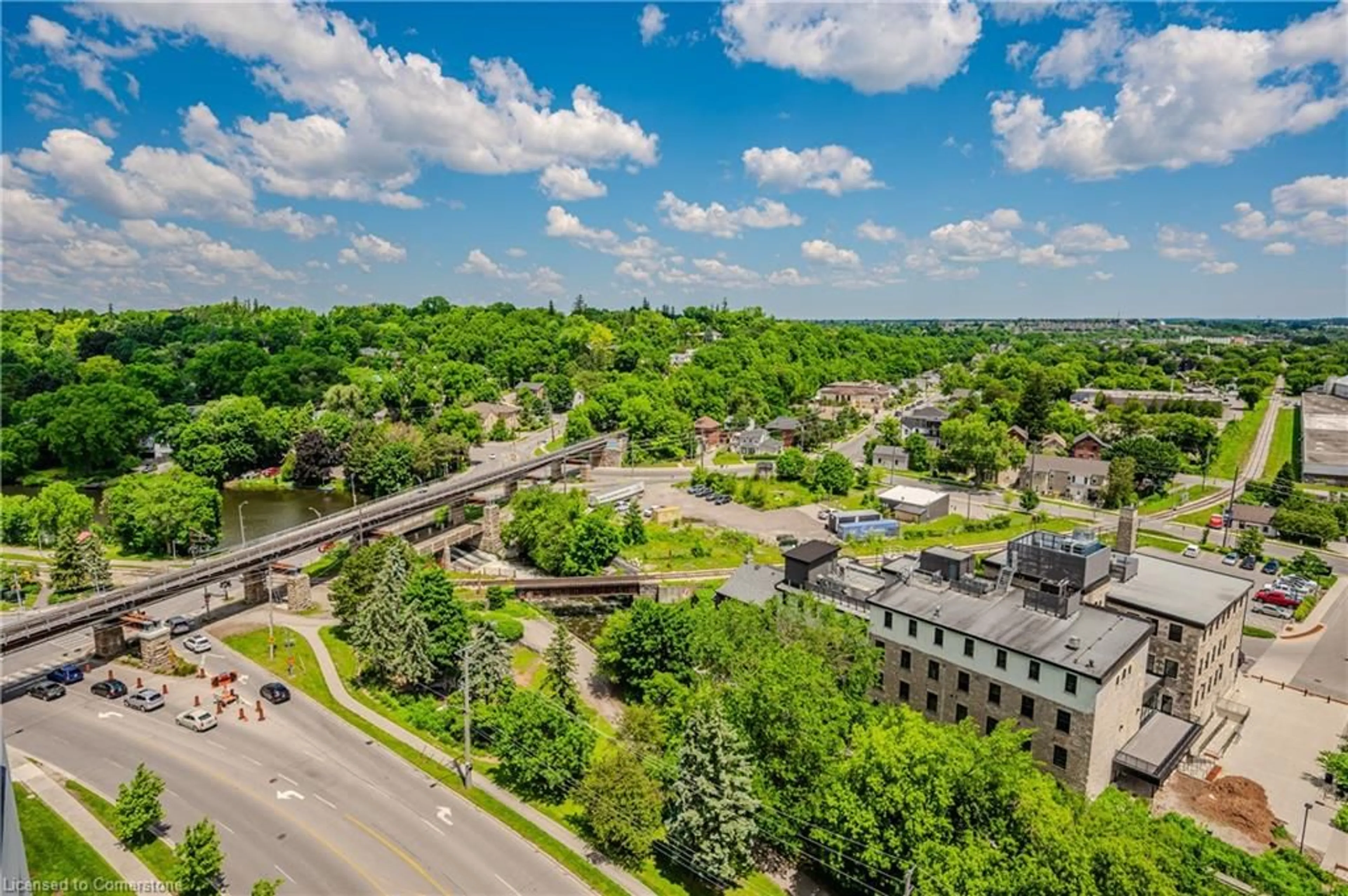 A pic from outside/outdoor area/front of a property/back of a property/a pic from drone, city buildings view from balcony for 150 Wellington St #1305, Guelph Ontario N1H 3R2