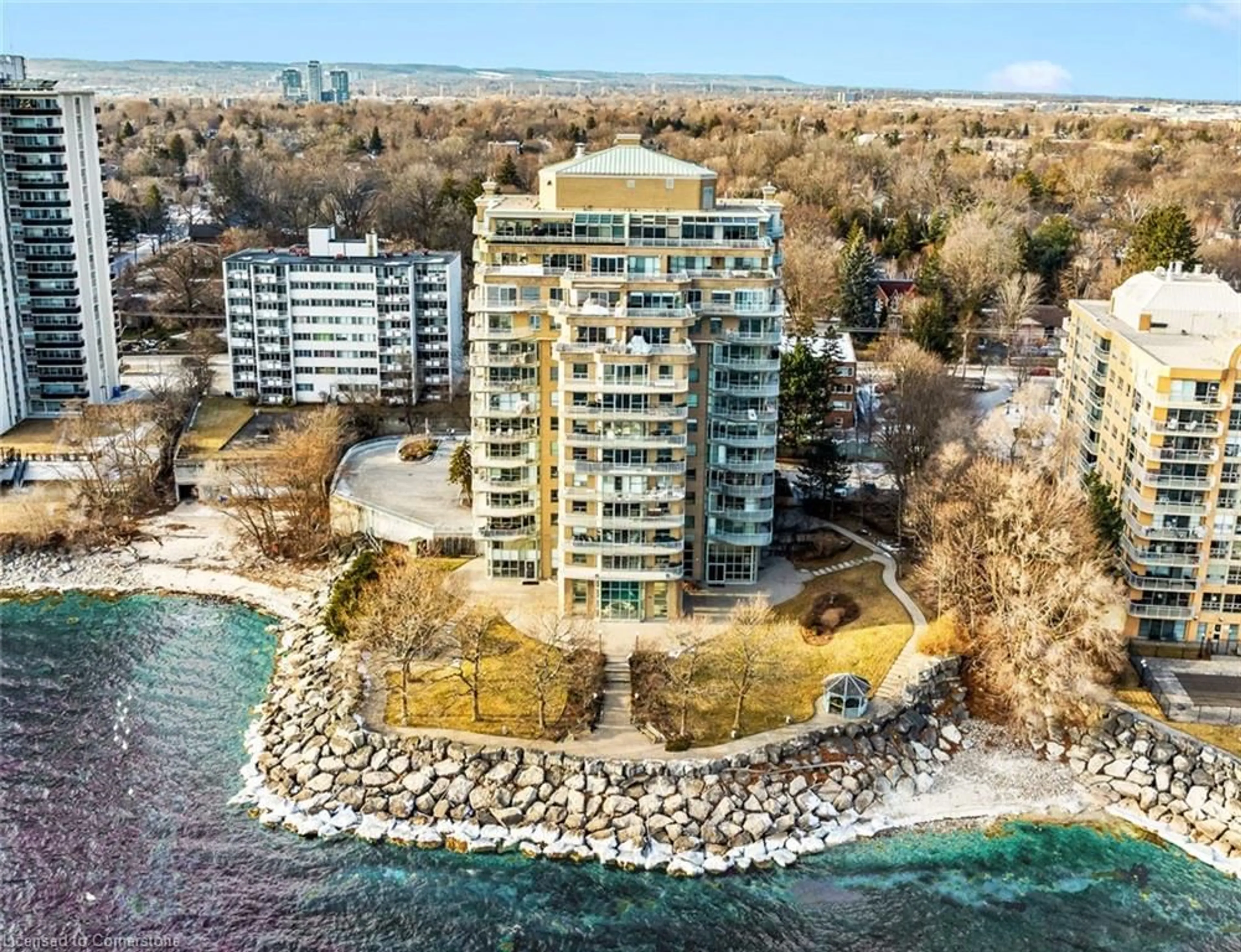 A pic from outside/outdoor area/front of a property/back of a property/a pic from drone, water/lake/river/ocean view for 2190 Lakeshore Rd #403, Burlington Ontario L7R 4K1