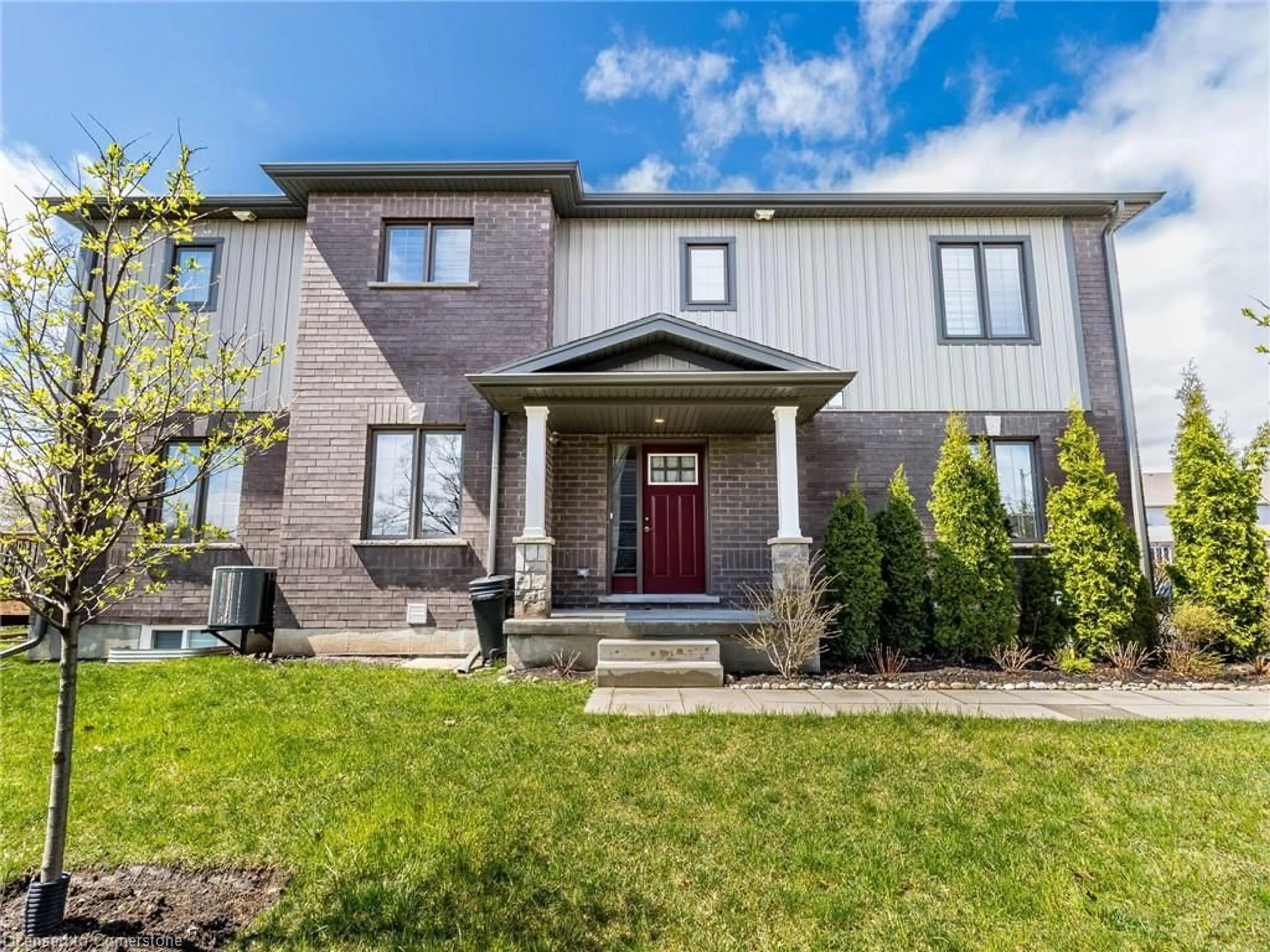 Home with brick exterior material, street for 135 Hardcastle Drive #1, Cambridge Ontario N1S 0B6