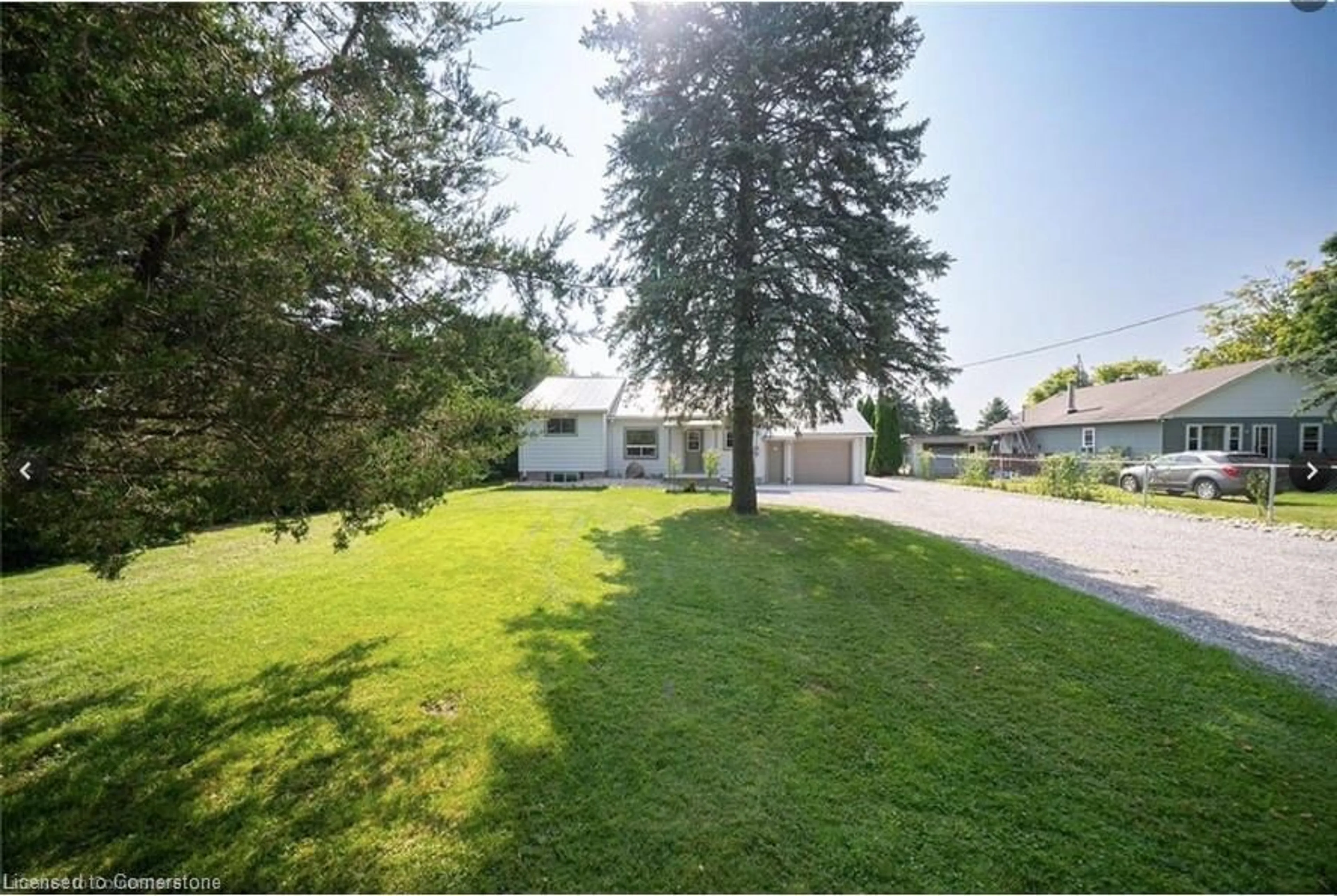 A pic from outside/outdoor area/front of a property/back of a property/a pic from drone, mountain view for 308 2nd Concession Rd, Tillsonburg Ontario N4G 4G9